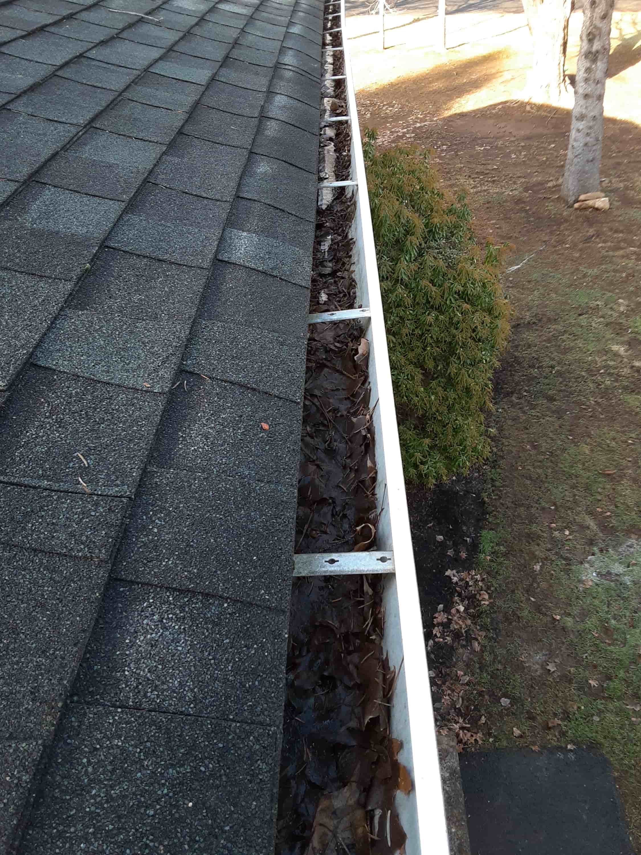 how to clean gutter drain pipes