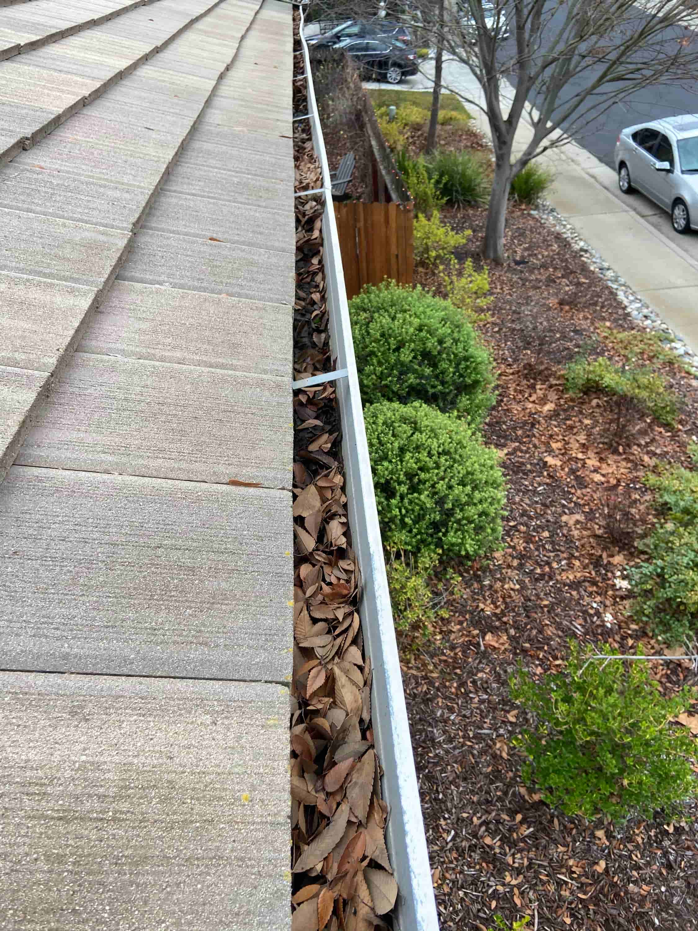when to clean gutters and downspouts