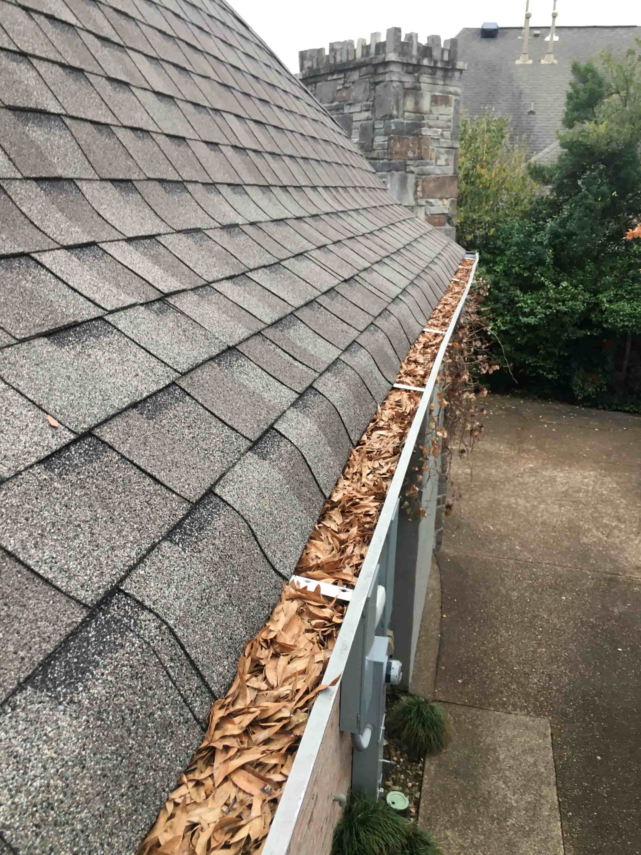 how to clean clogged gutter downspout