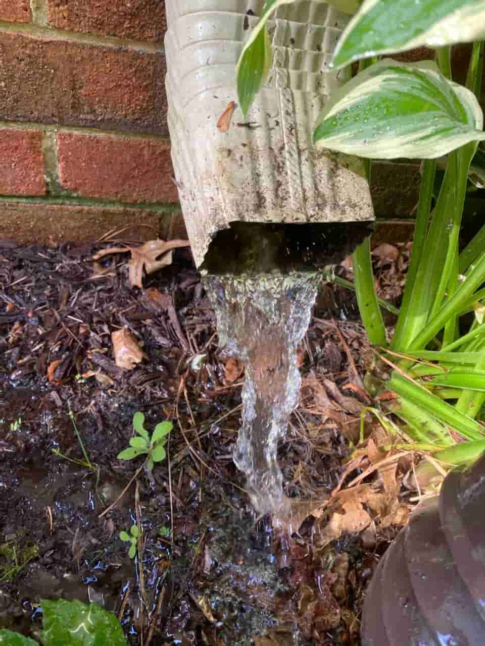 how to clean rain drain pipes