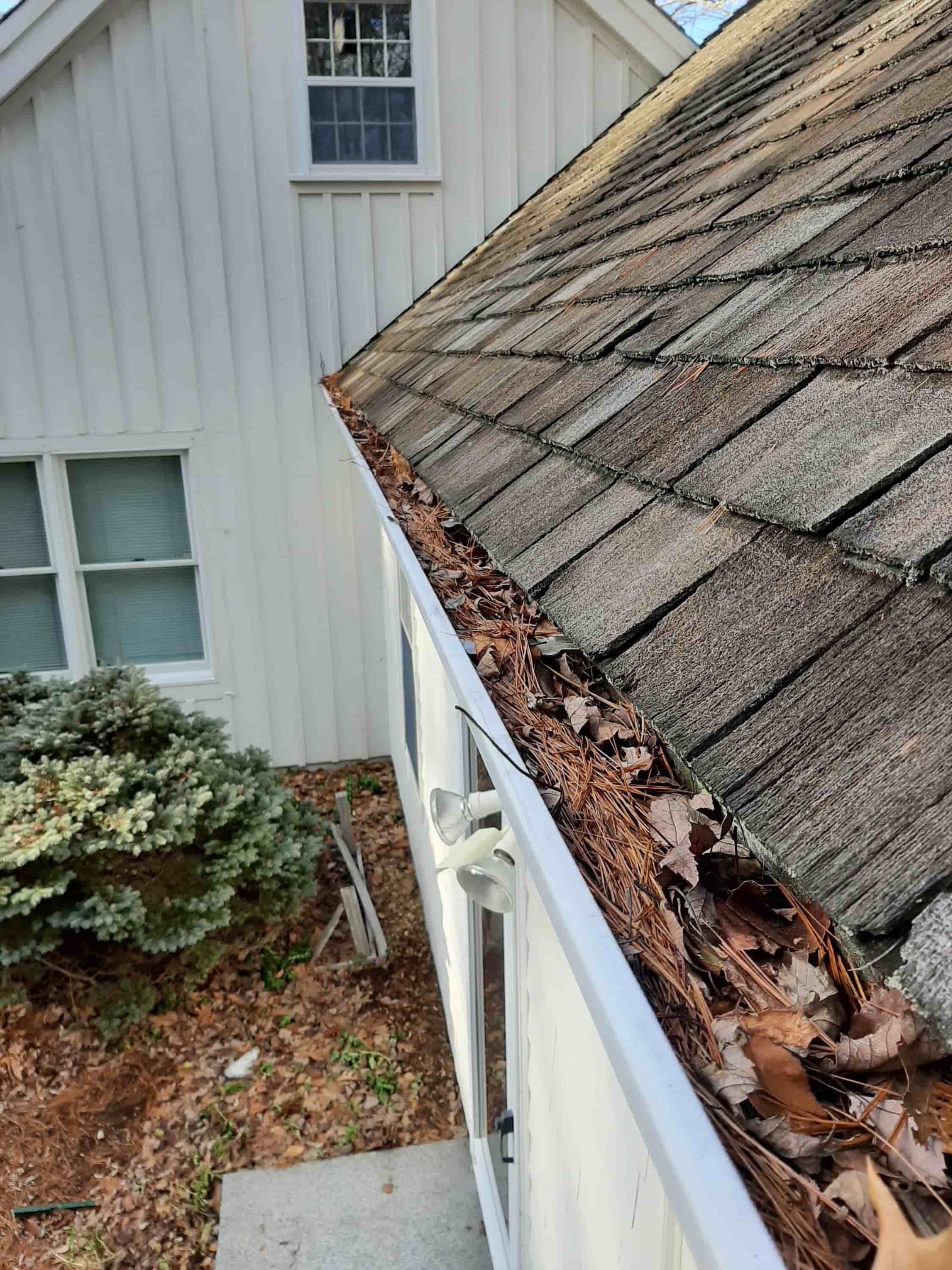 unclogging gutters