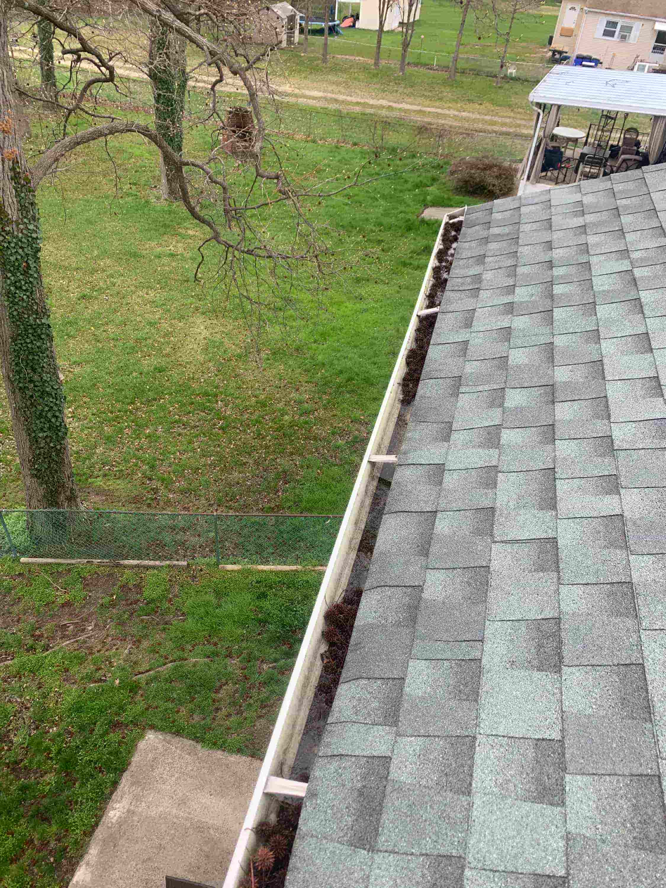 using a leaf blower to clean gutters