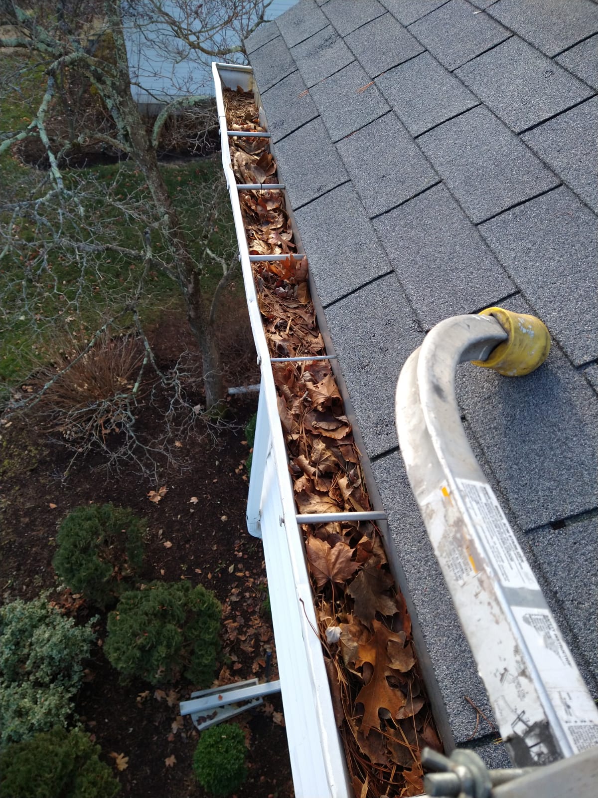 cleaning out downspouts