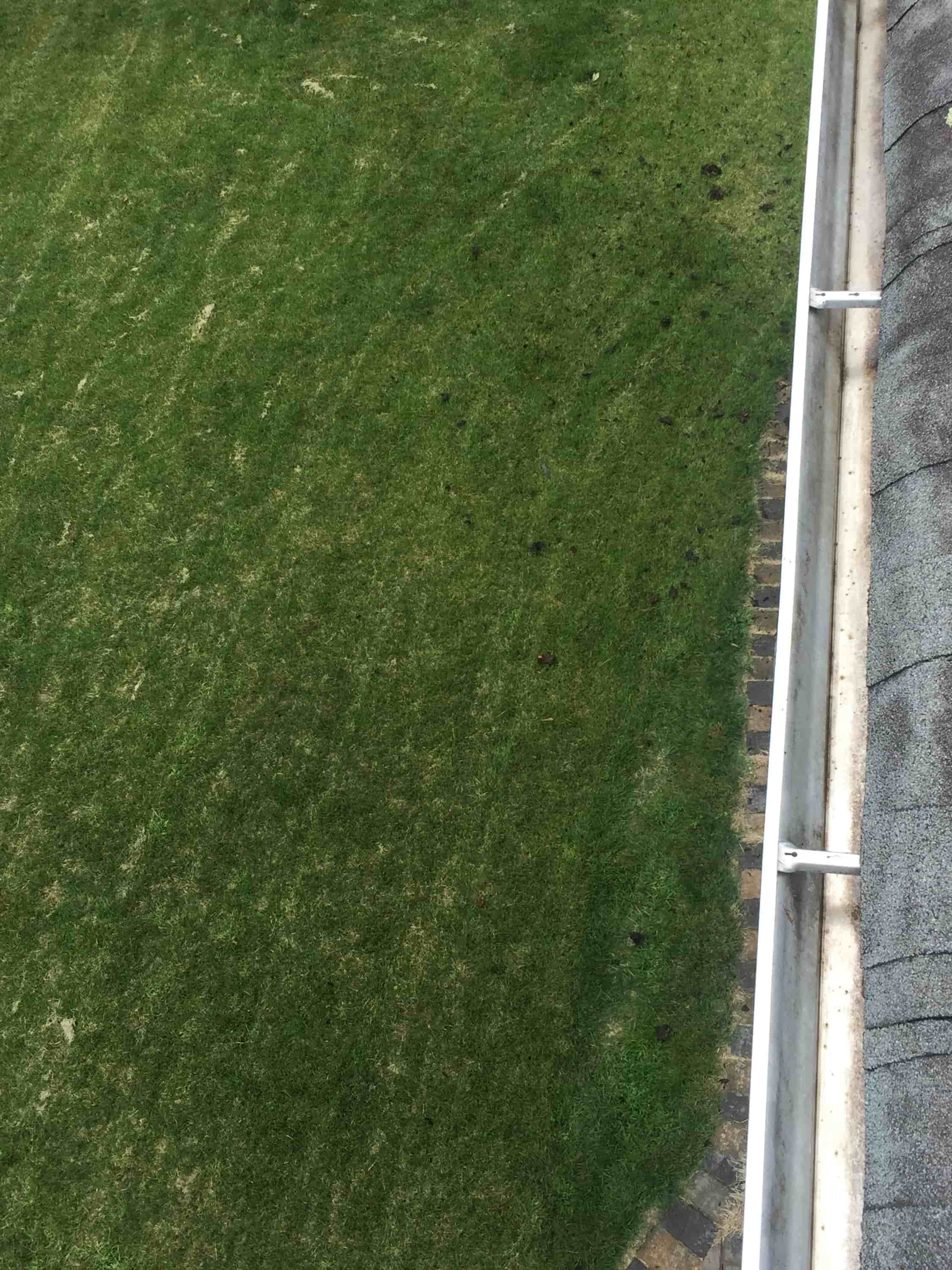 cleaning gutter downspout