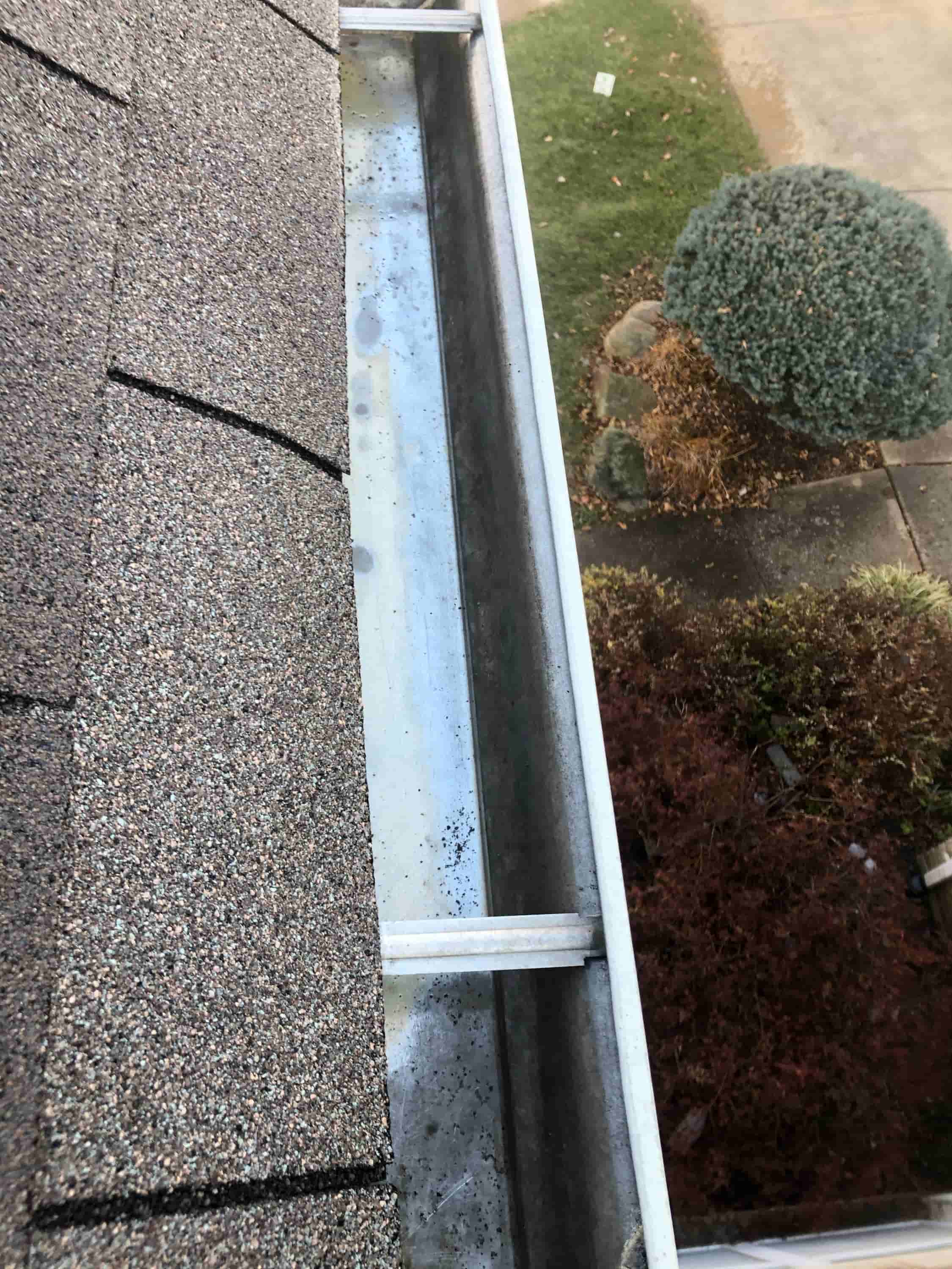 who cleans gutters