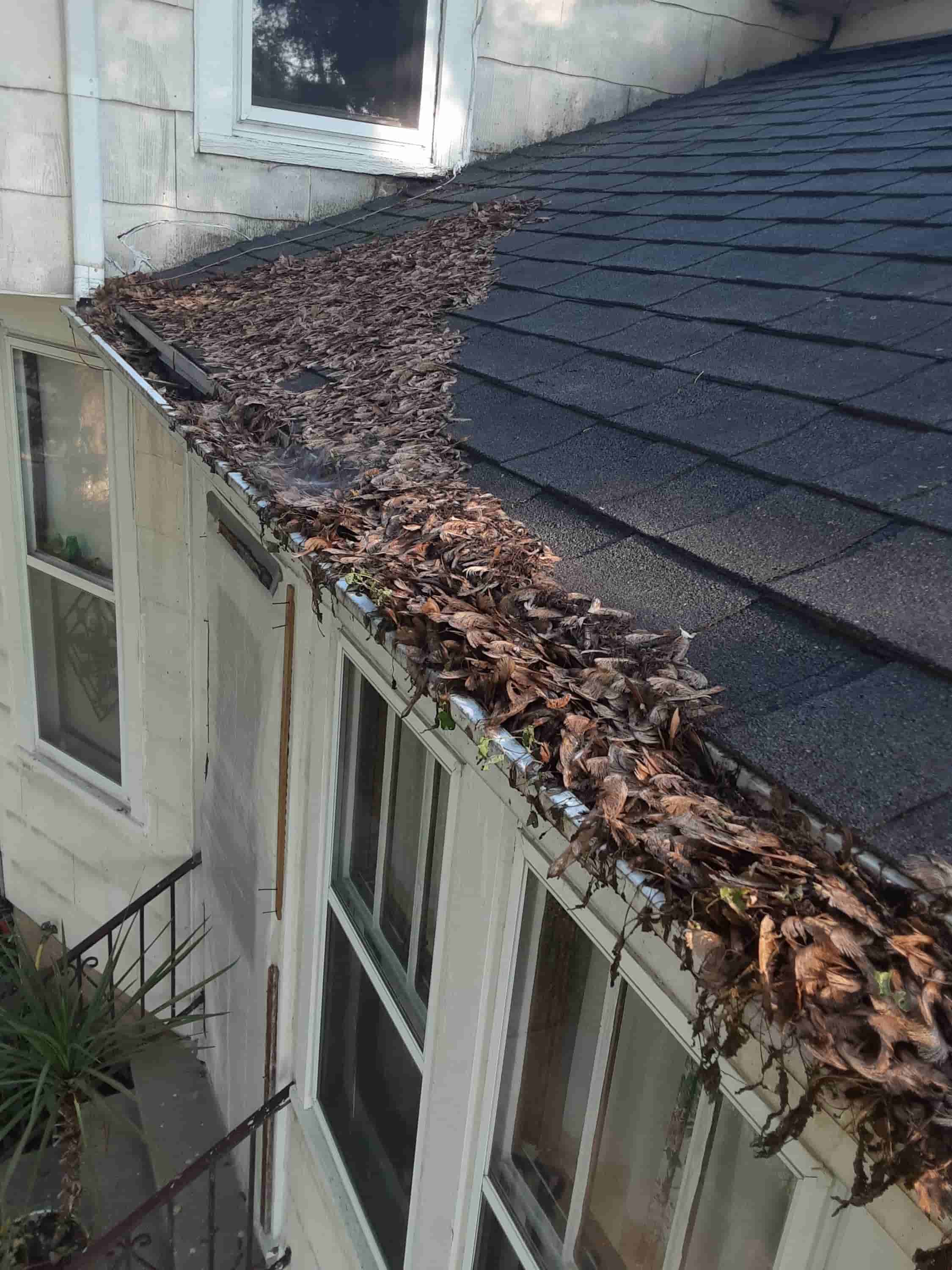 how to clean out a clogged downspout