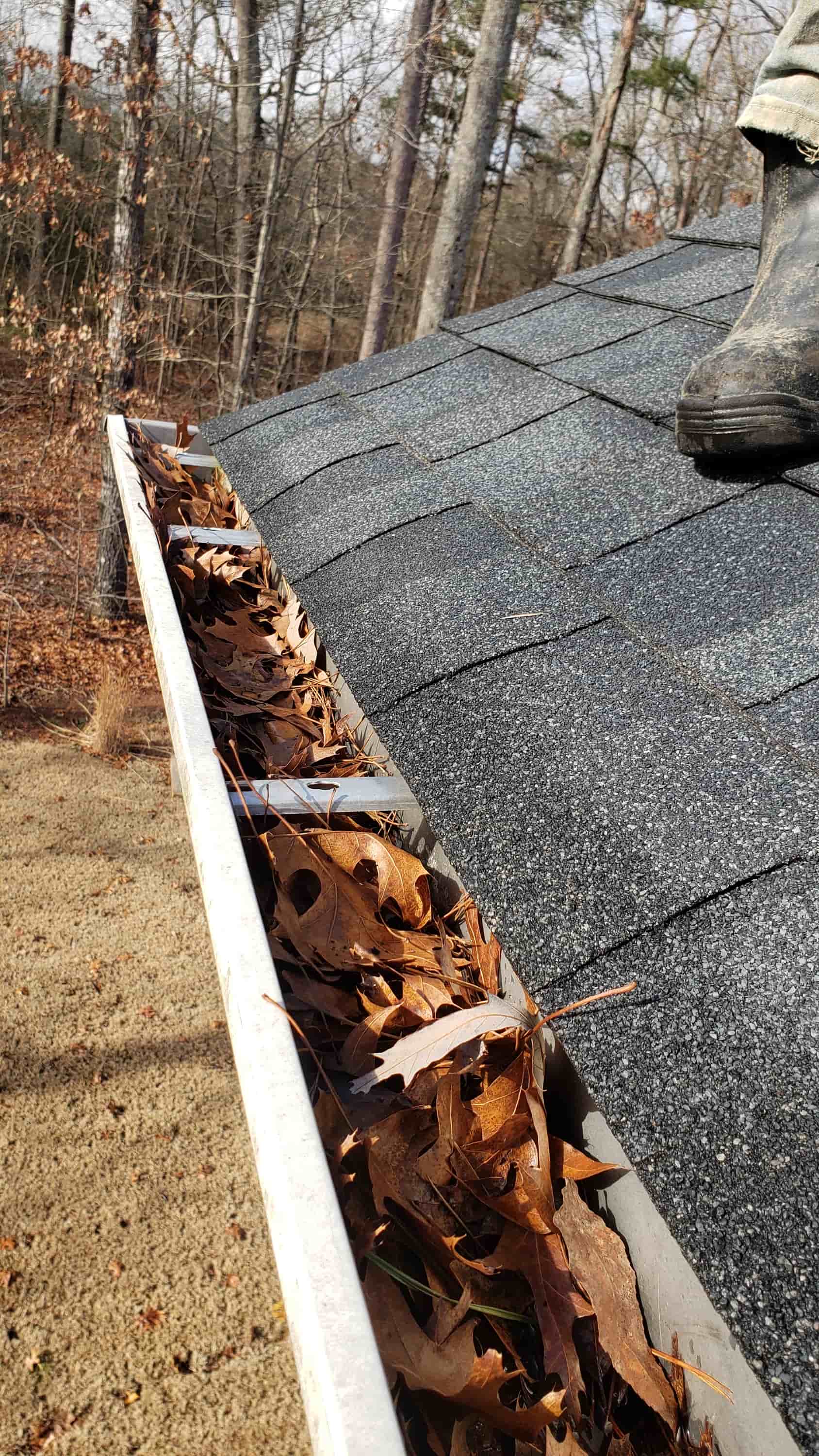 cleaning a gutter