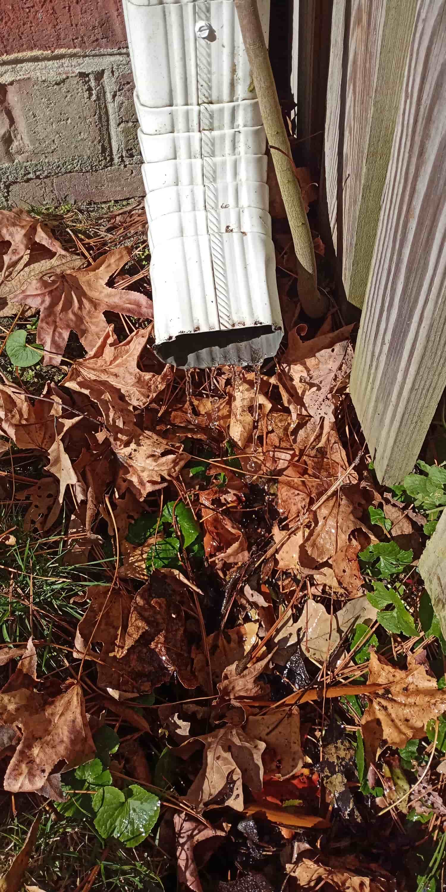 how to clean out a downspout