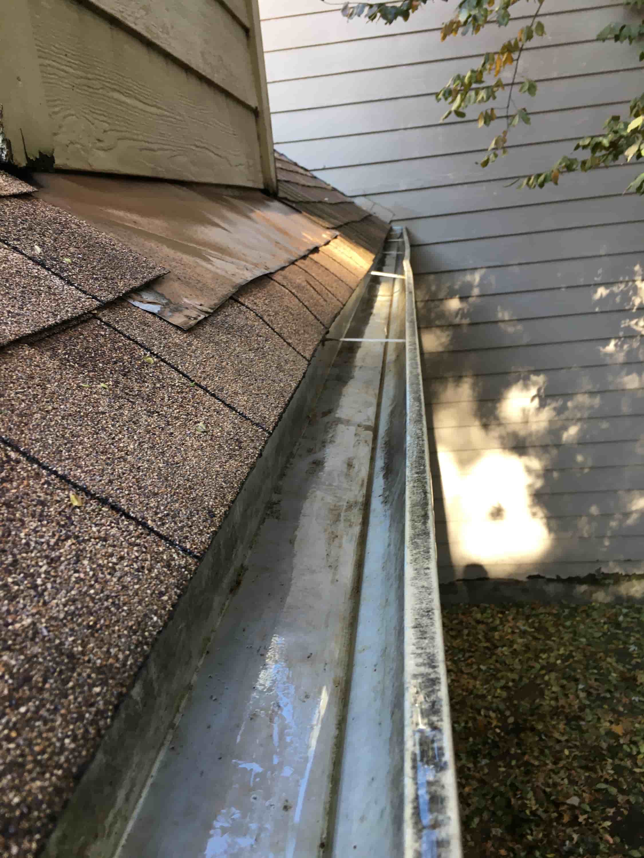 how to clean out a clogged downspout
