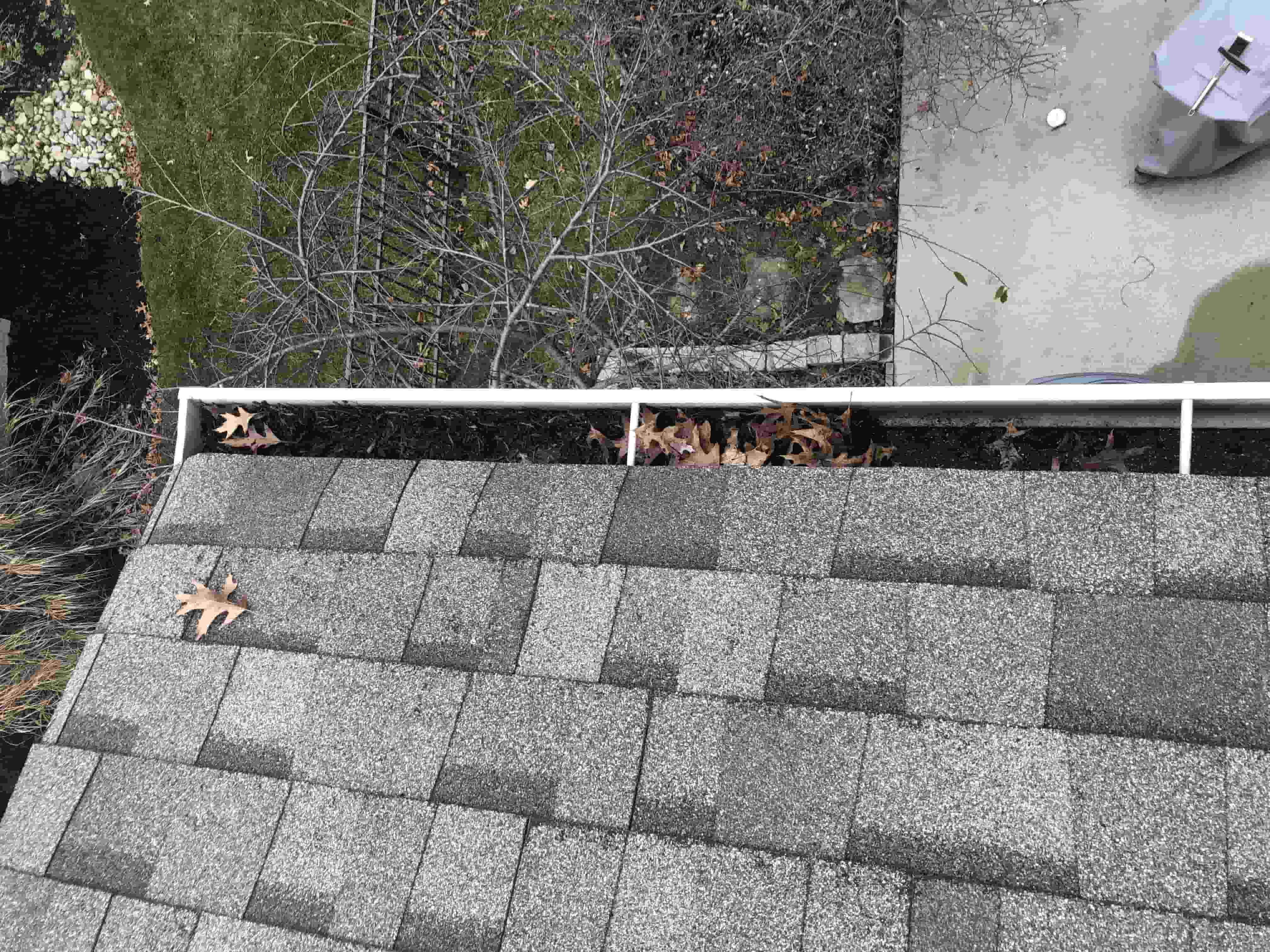 how to clean clogged gutters