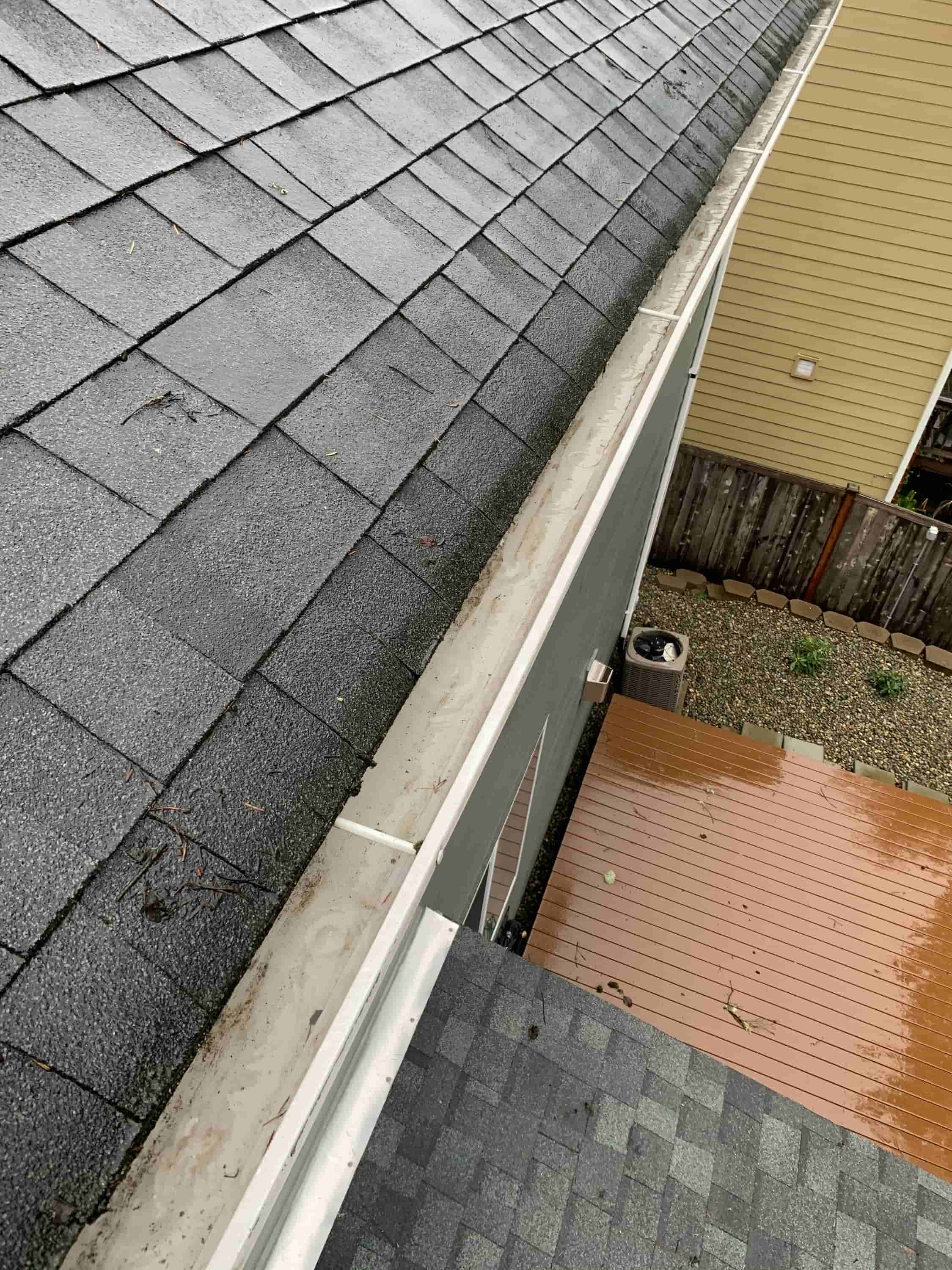 how to clean gutters with guards