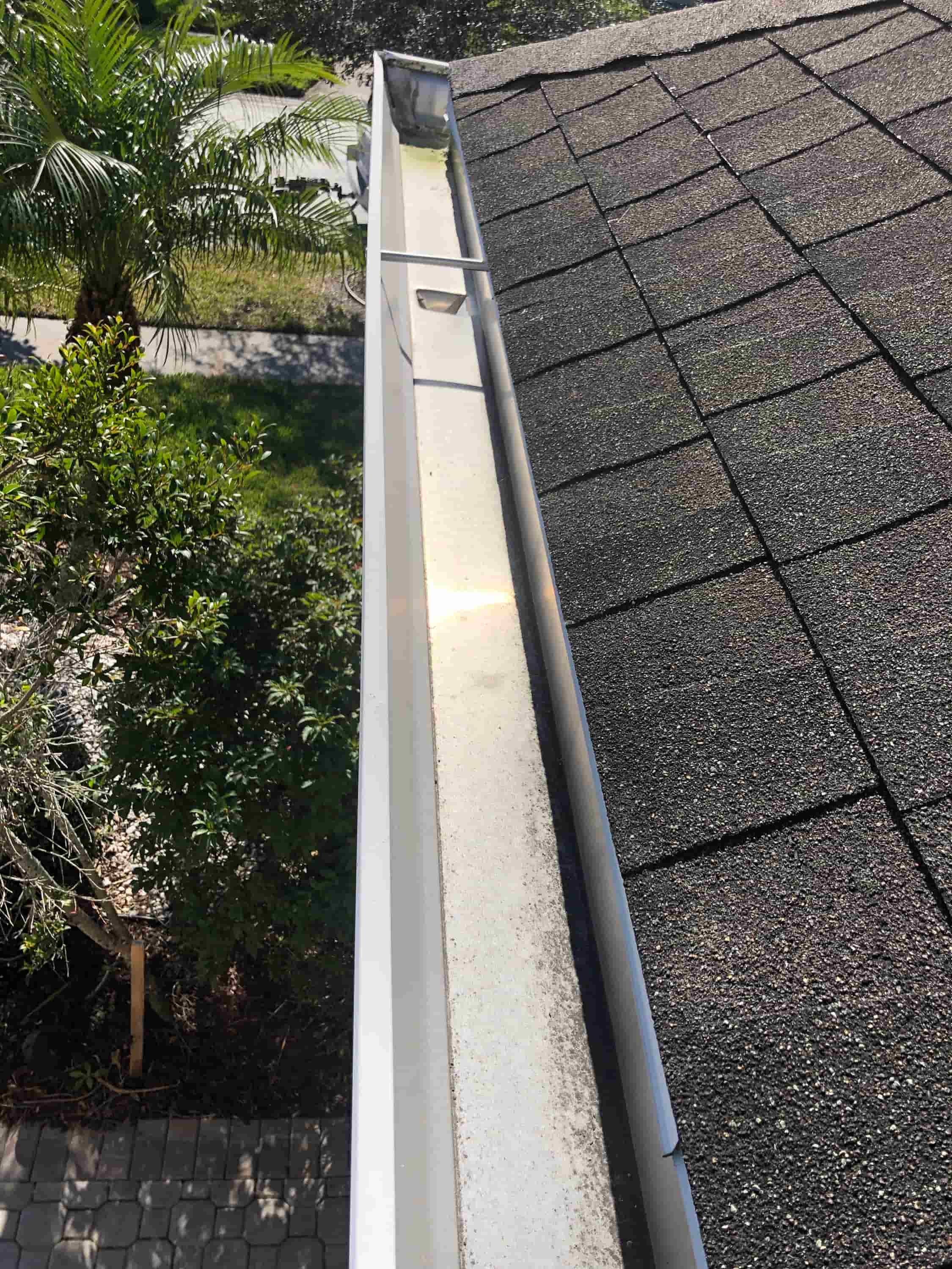 cleaning rain gutters from ground
