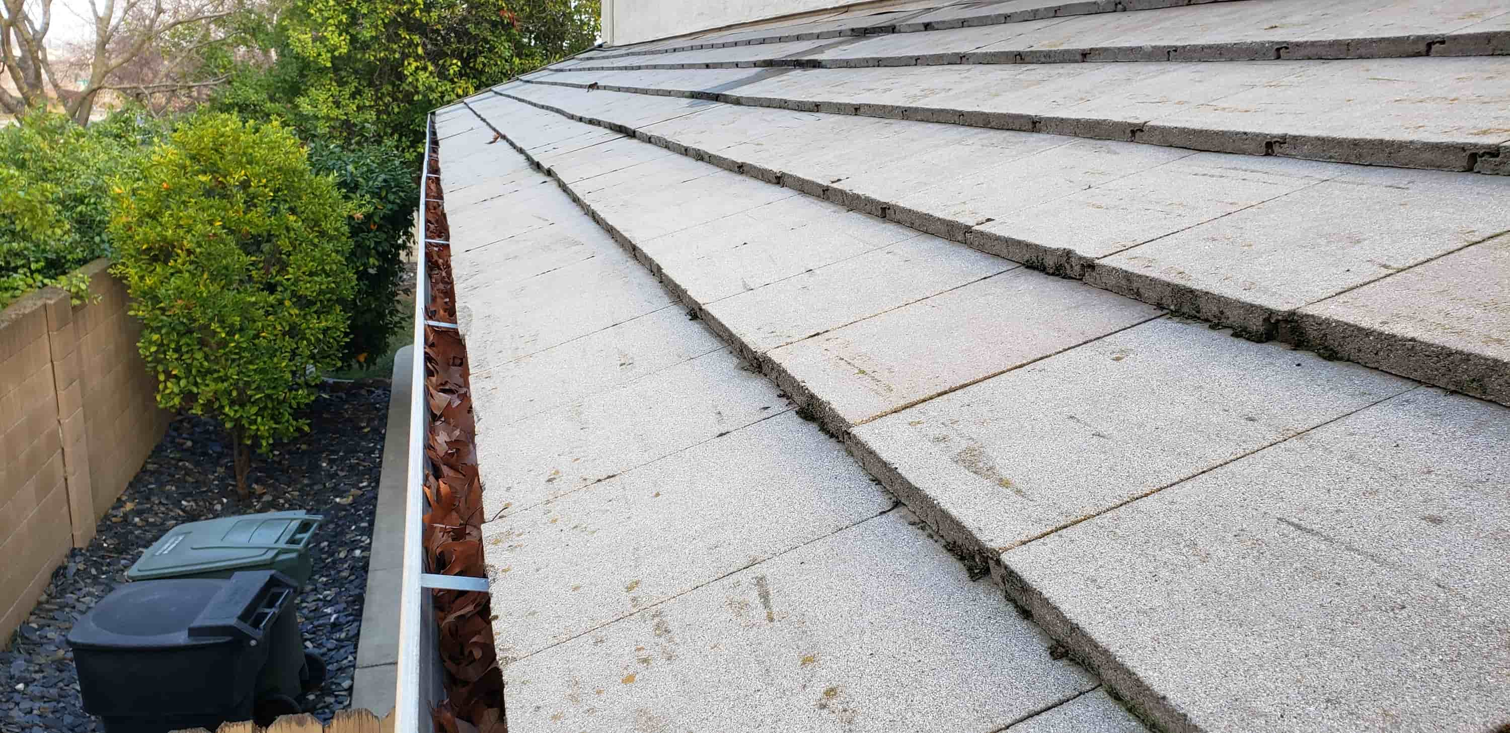 diy gutter cleaning from the ground