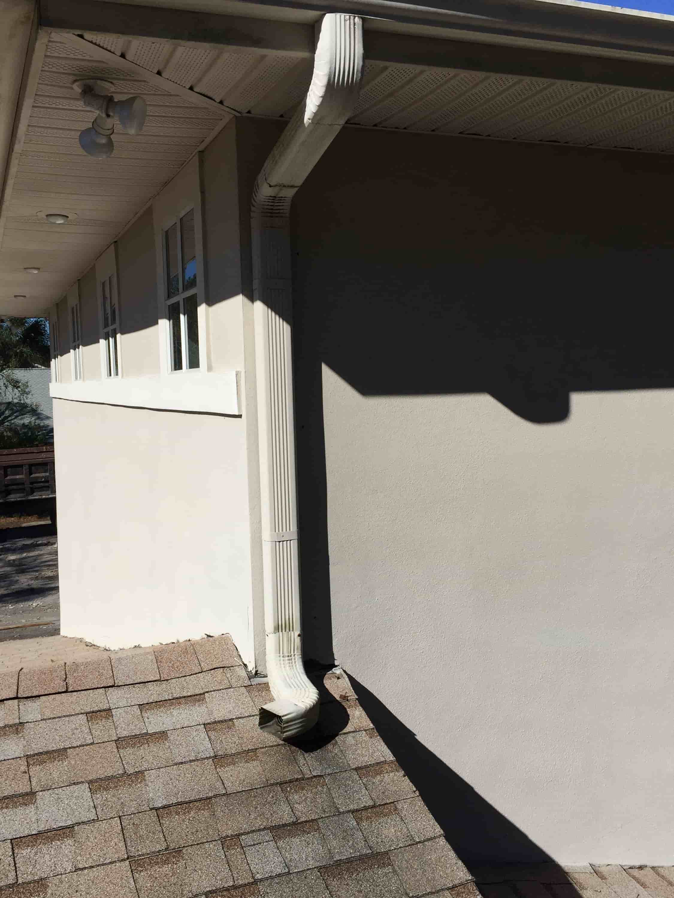 clean your gutters from the ground