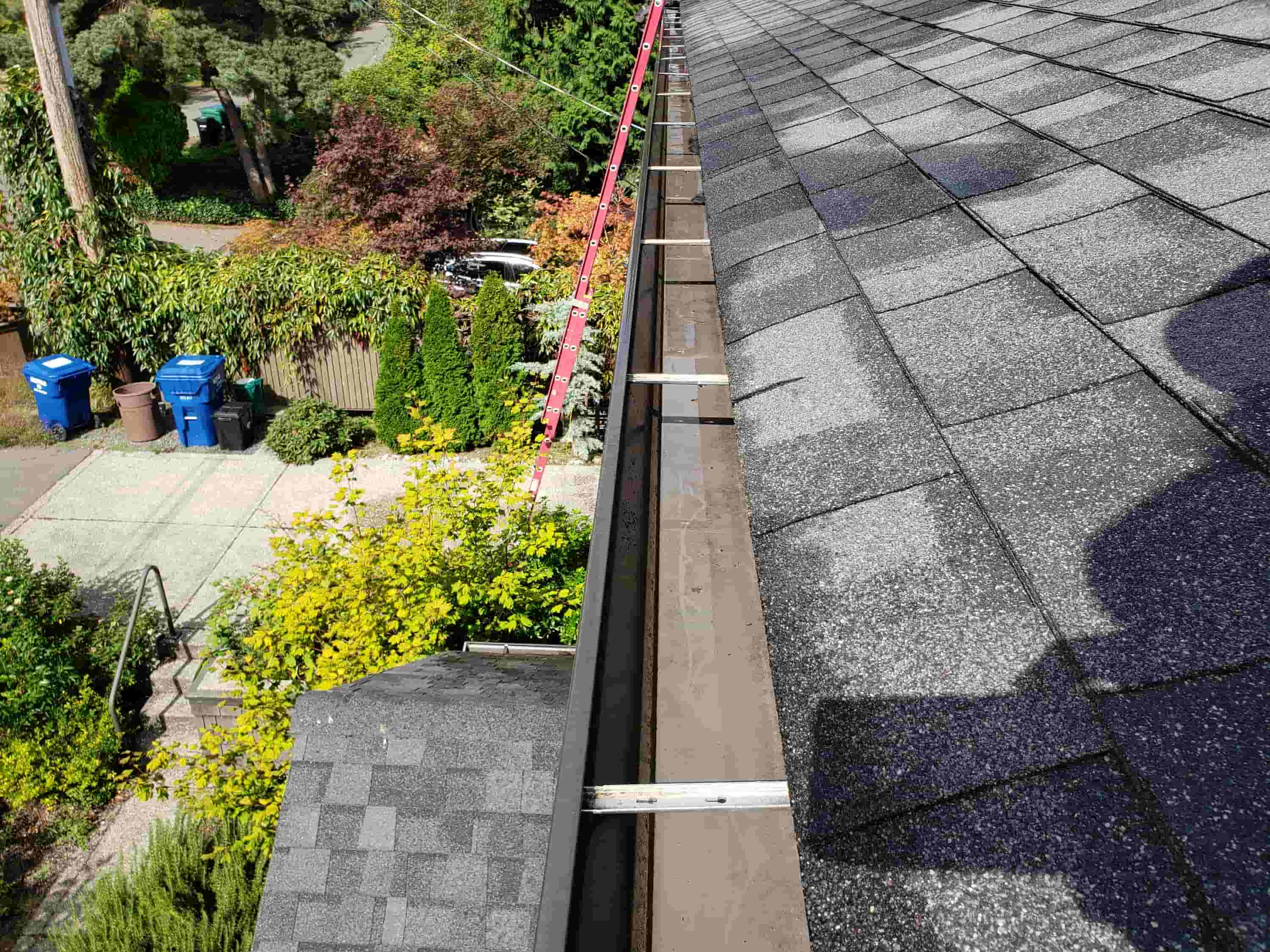 how to clean gutters with guards