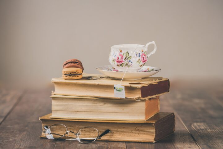 teacup on top of books