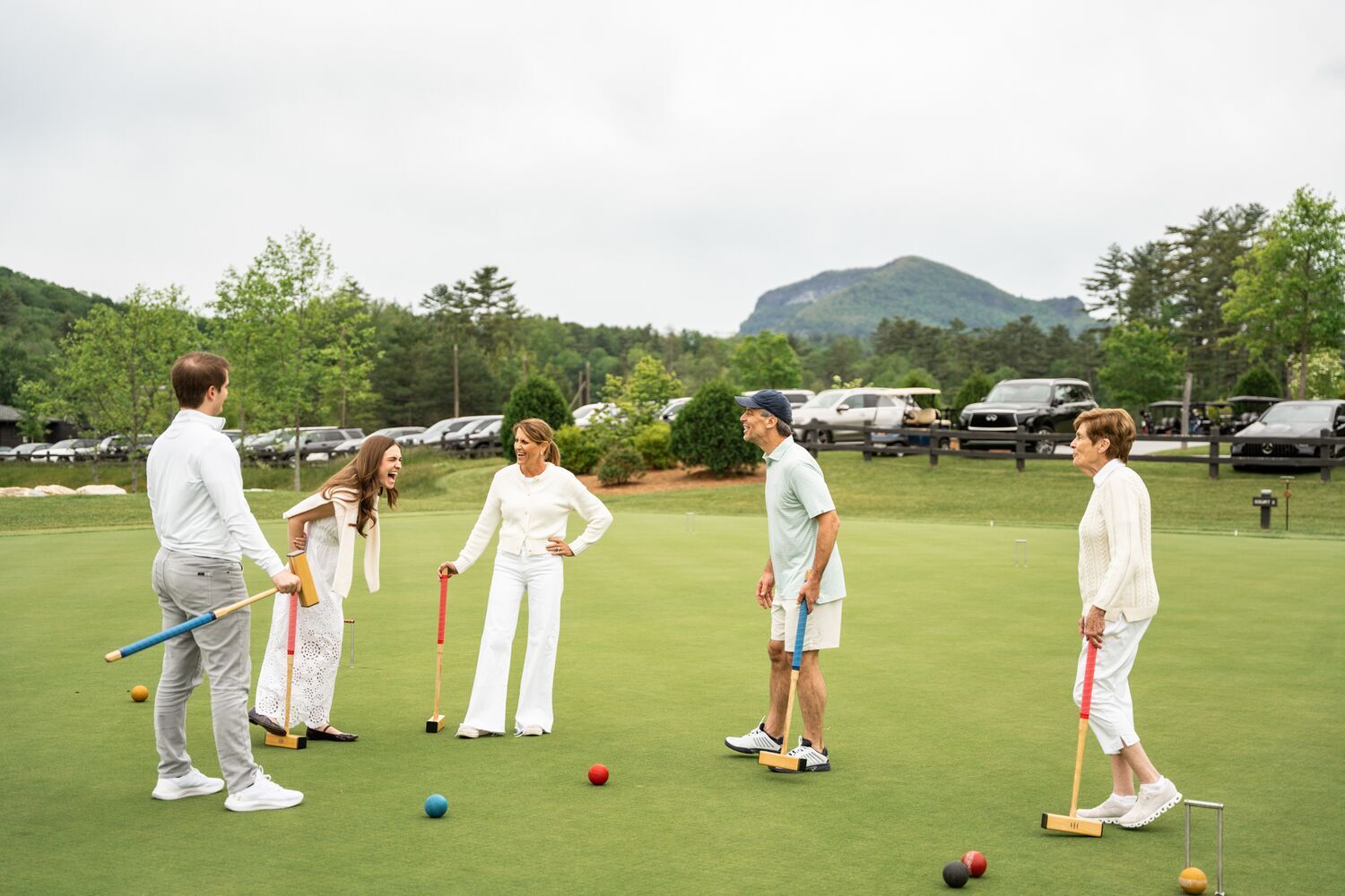 Family Playing Croquet in Spring