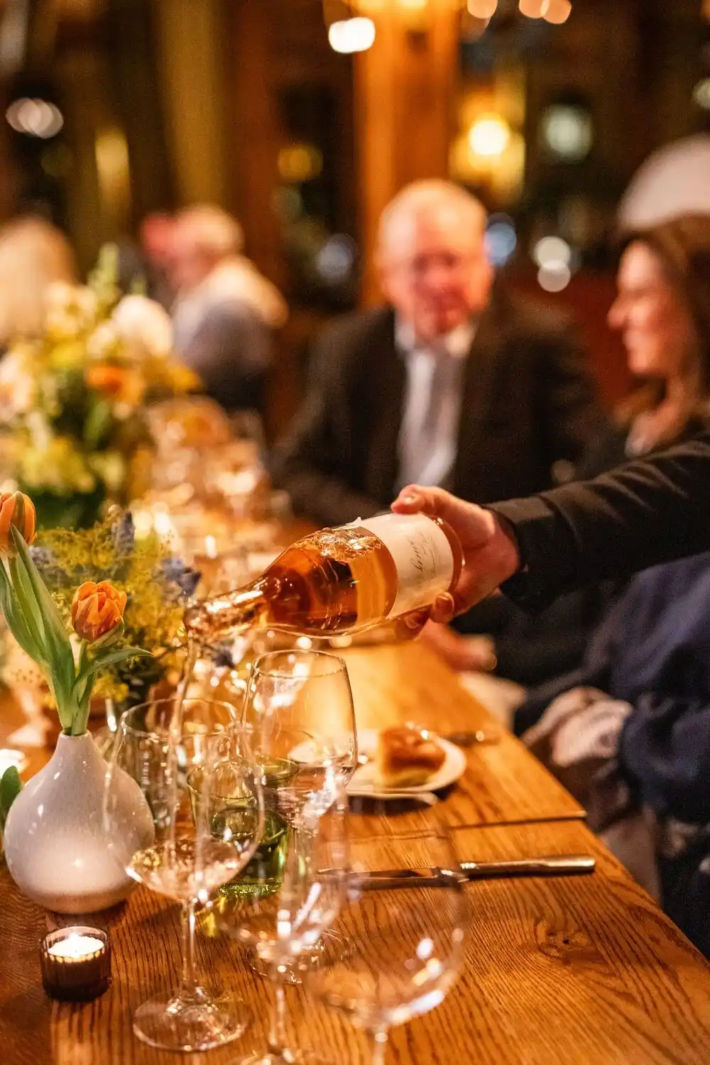 Sommelier Pouring Wine for Guest