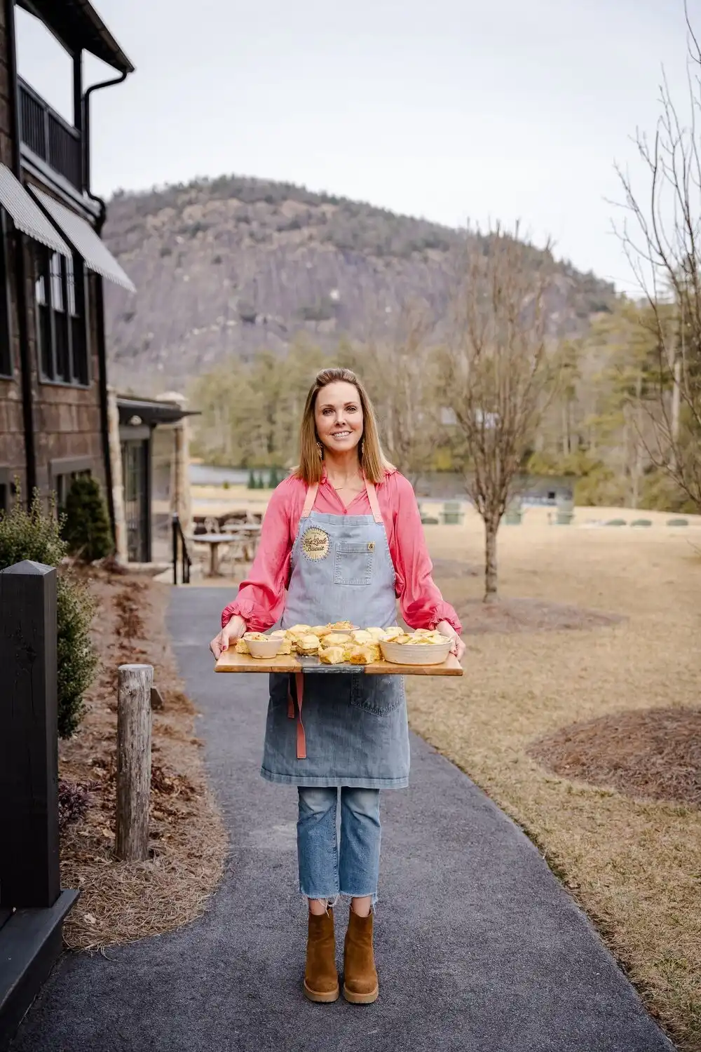 Carrie Morey Holding Pan of Biscuits