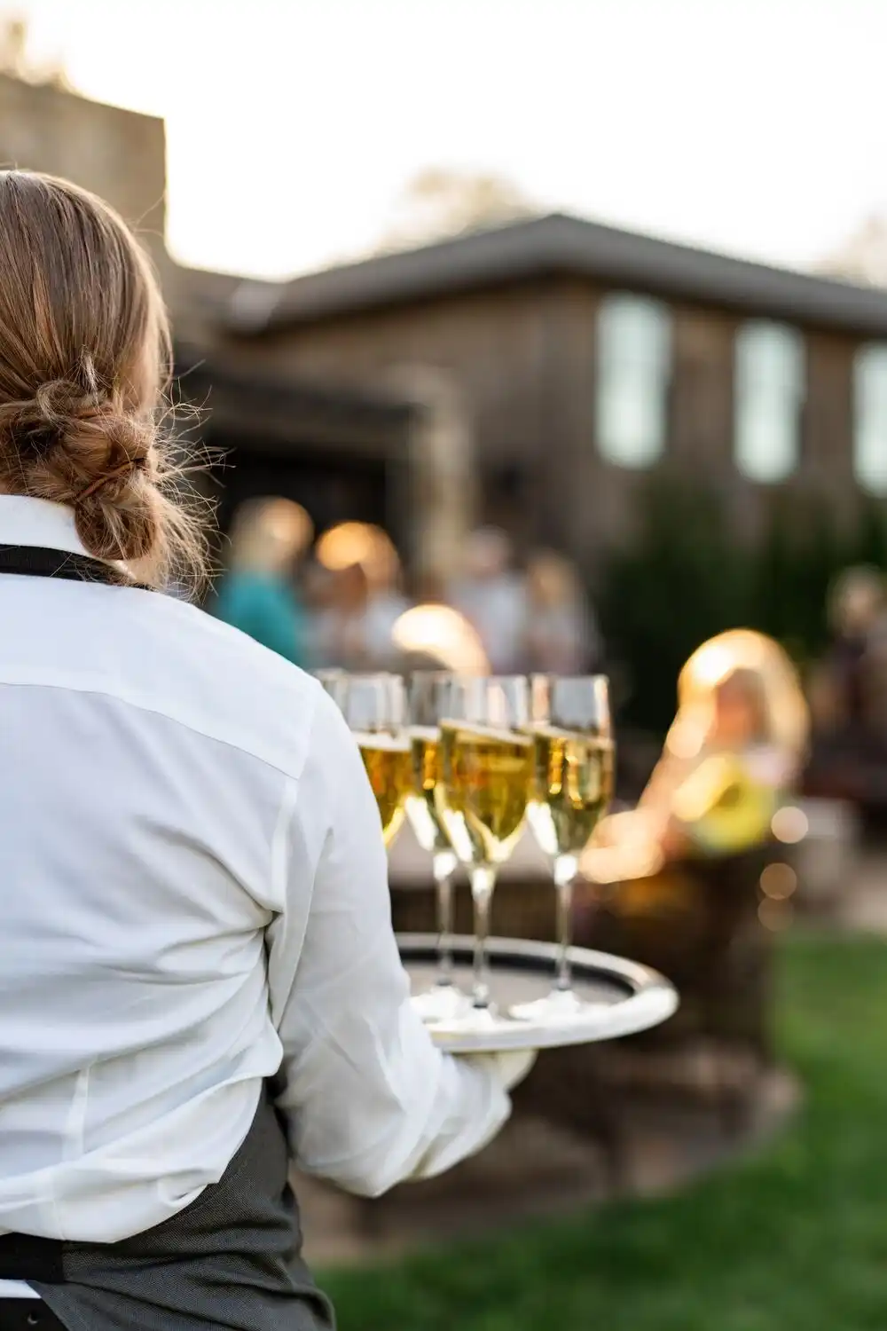 Server Serving Champagne