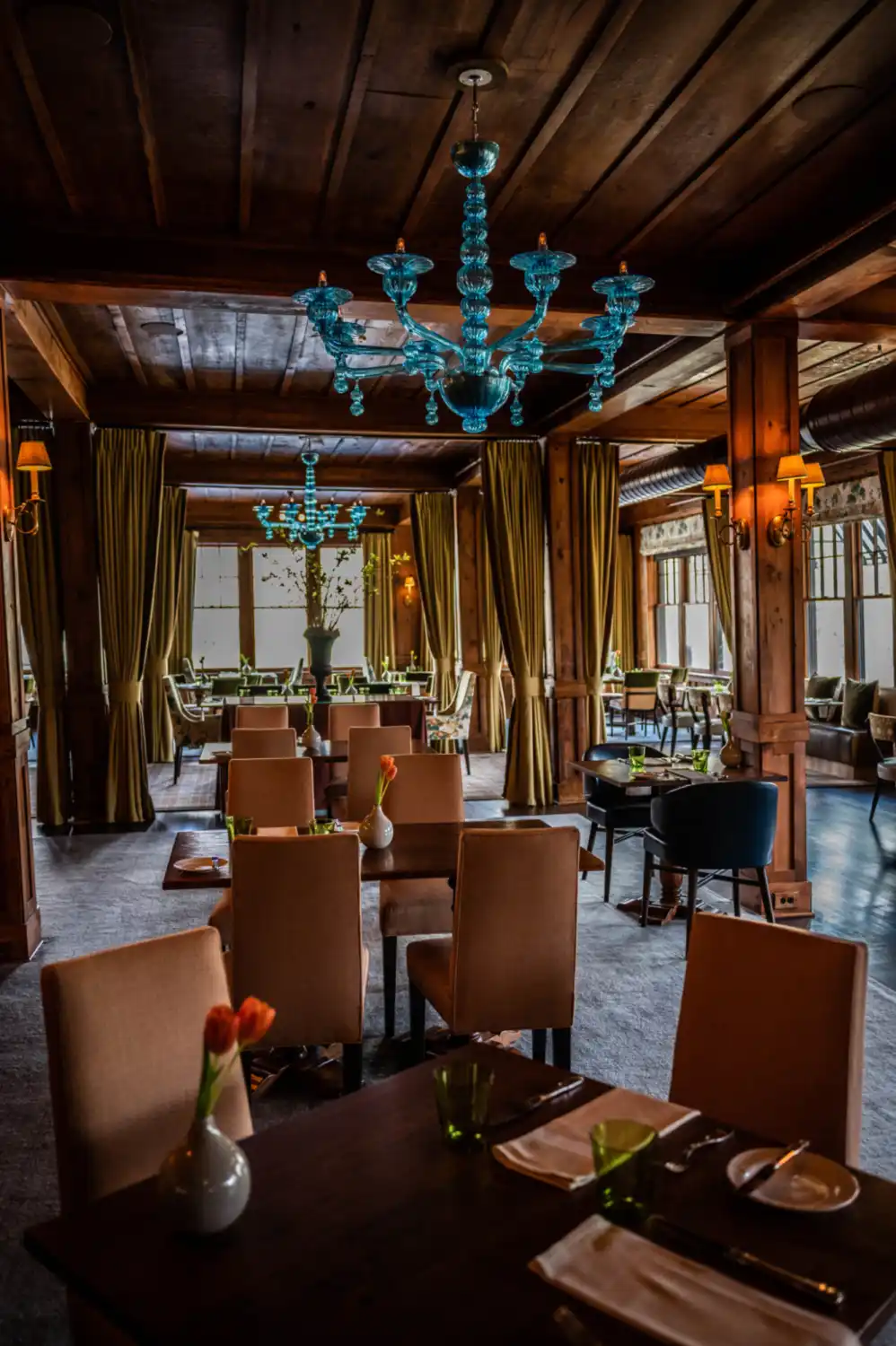 A warmly lit dining room ready to welcome guests