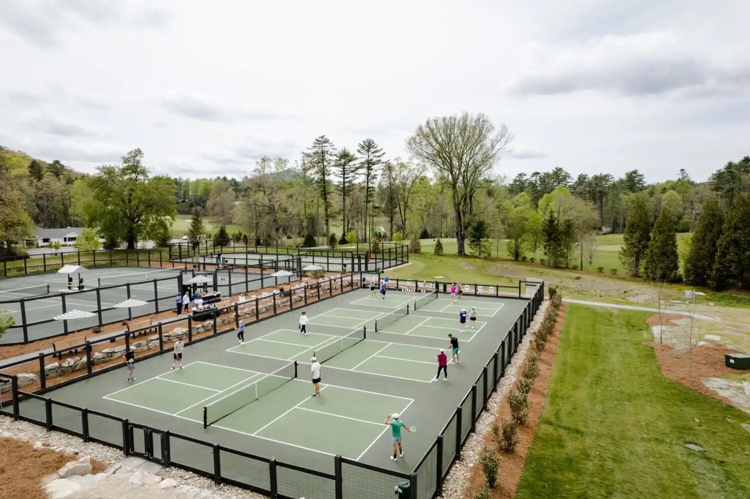 Large group of people playing Pickleball in Spring