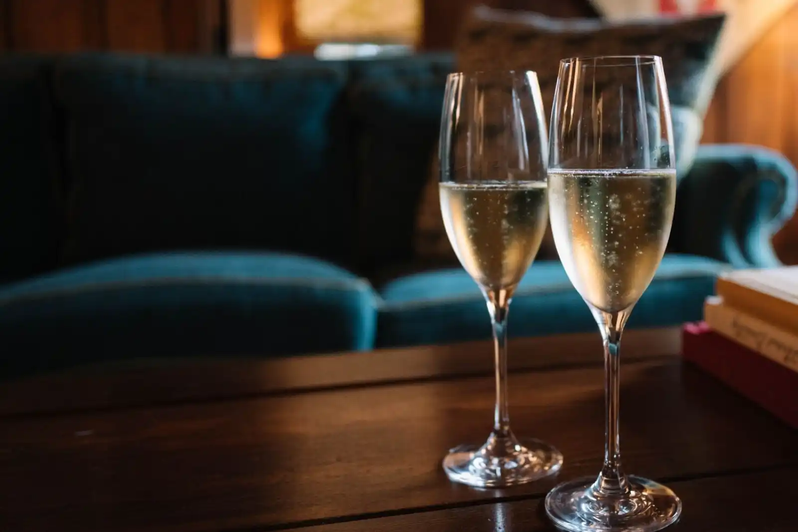 2 Glasses of Champagne Sitting on a Table 2 Glasses of Champagne Sitting on a Table