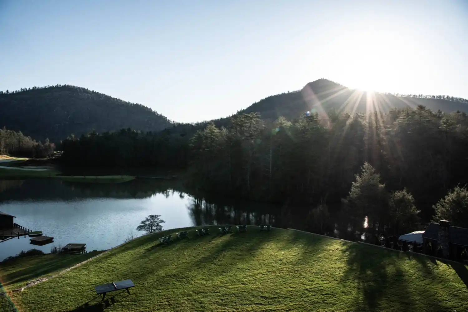 The sun rising over Hampton Lake