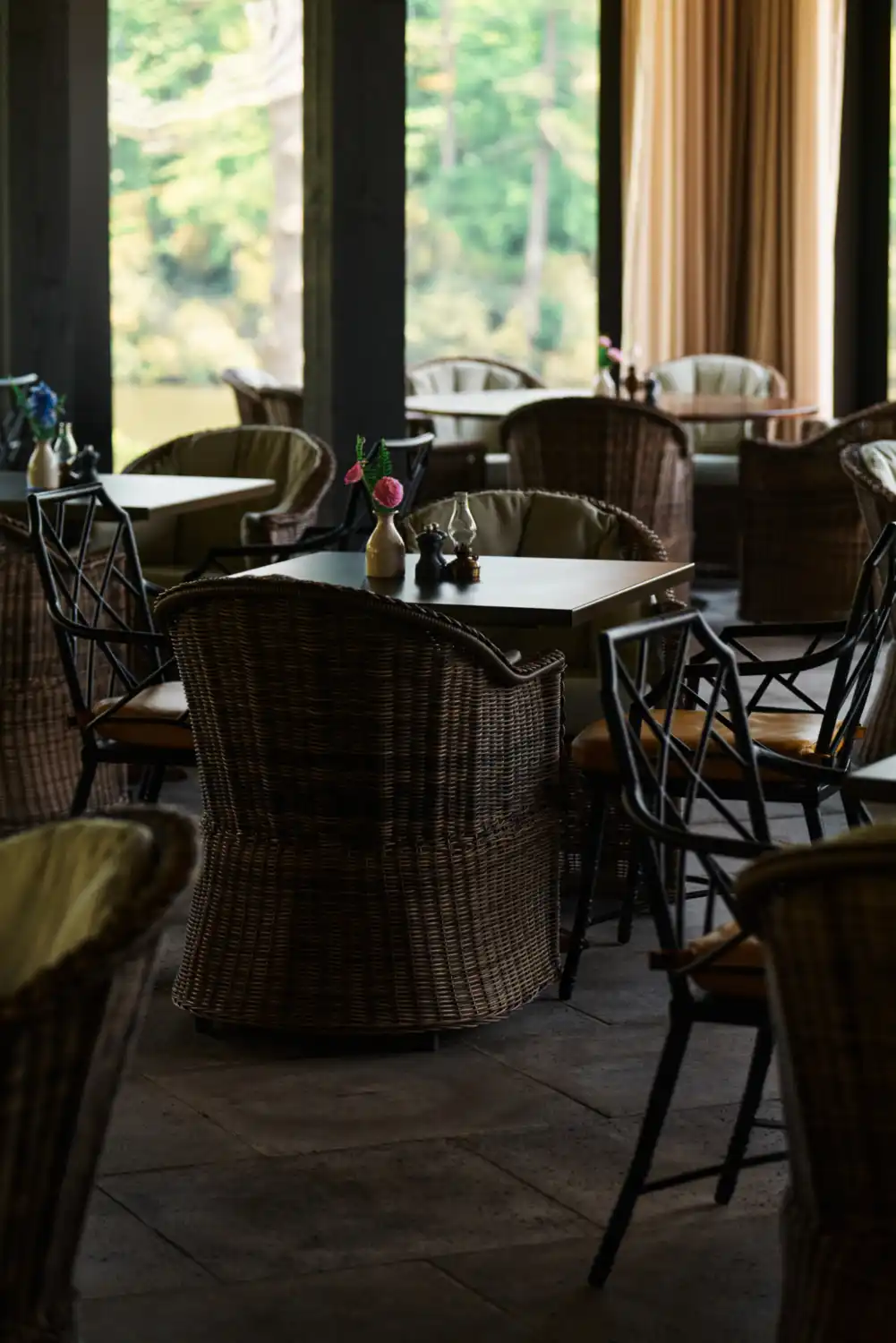 A dining table with chairs ready to welcome guests