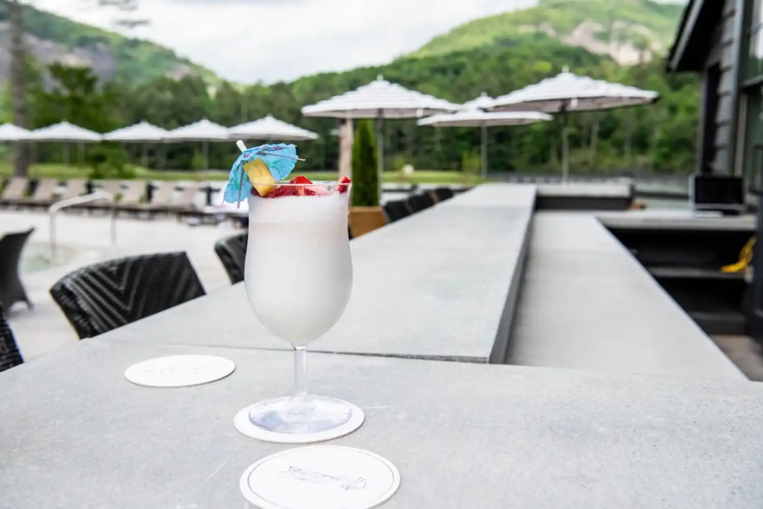 A blended drink with an umbrella