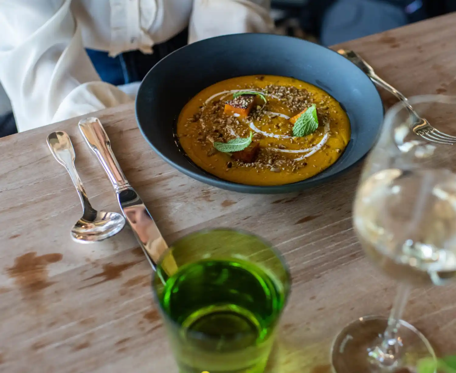Soup and wine on a table