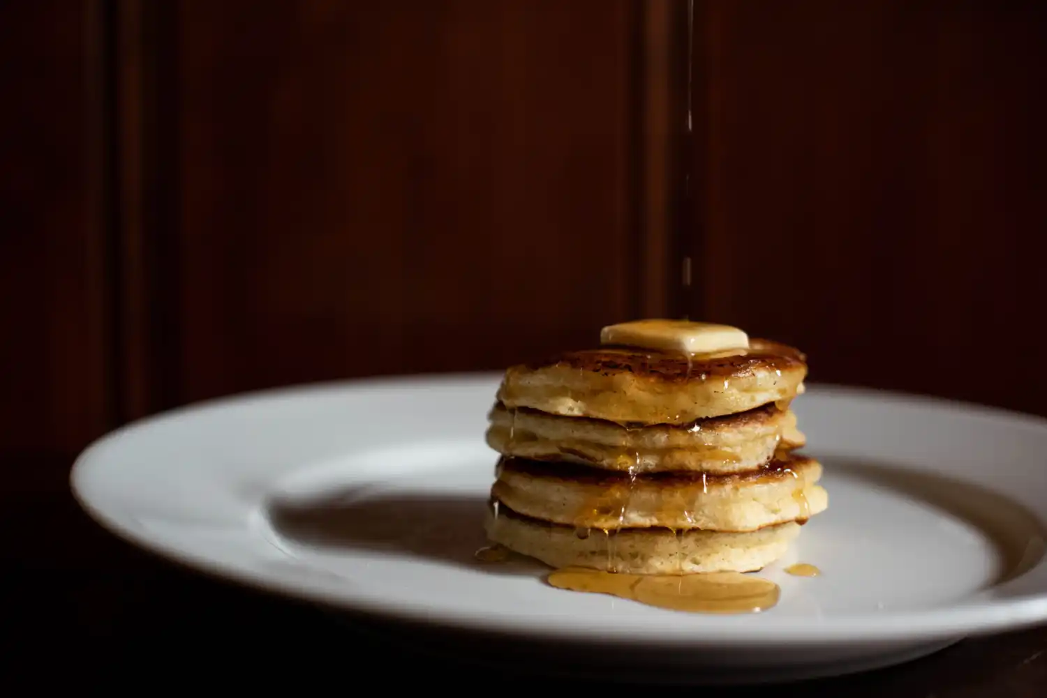 Pancakes with syrup and butter