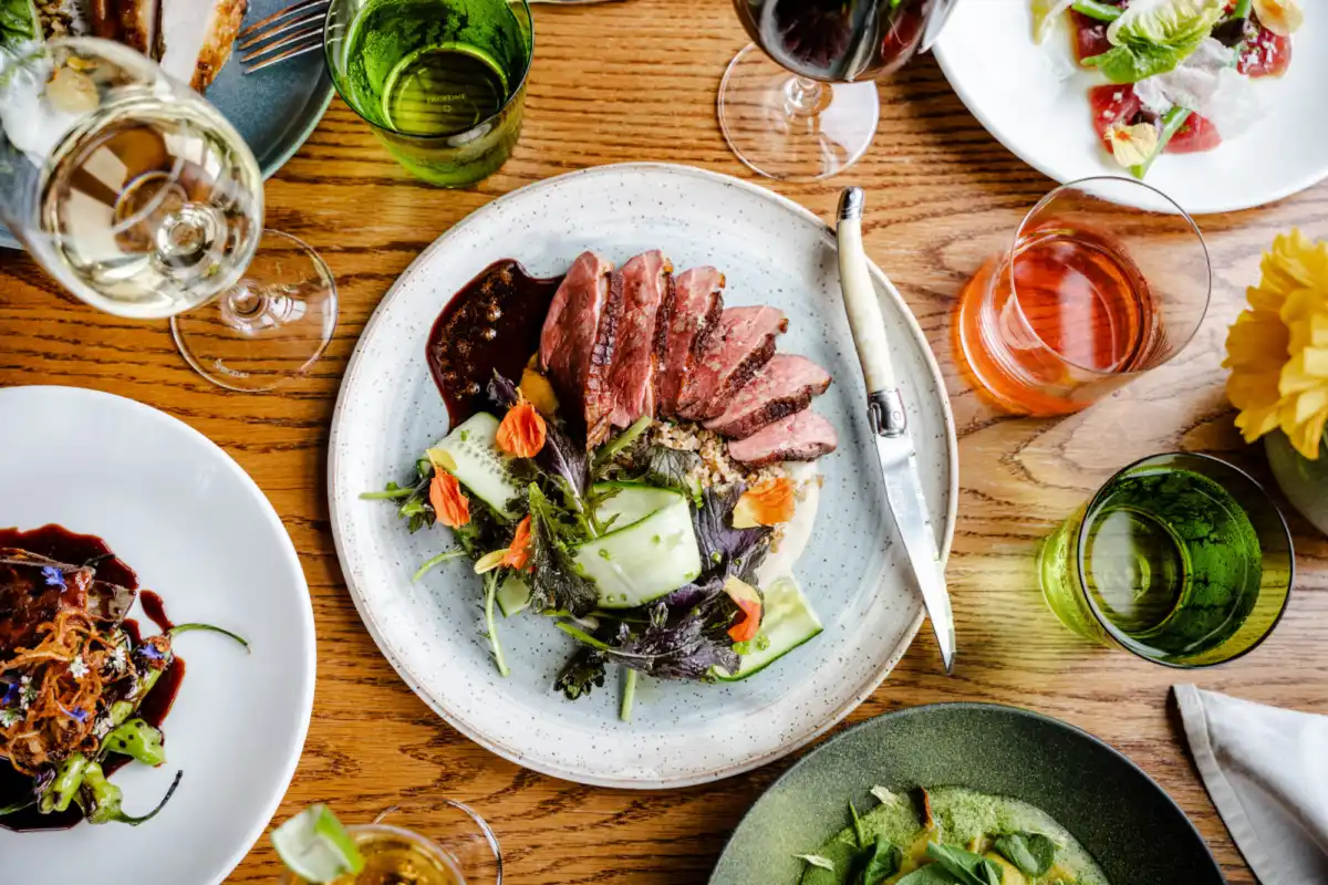 An overview shot of a savory protein and vegetables