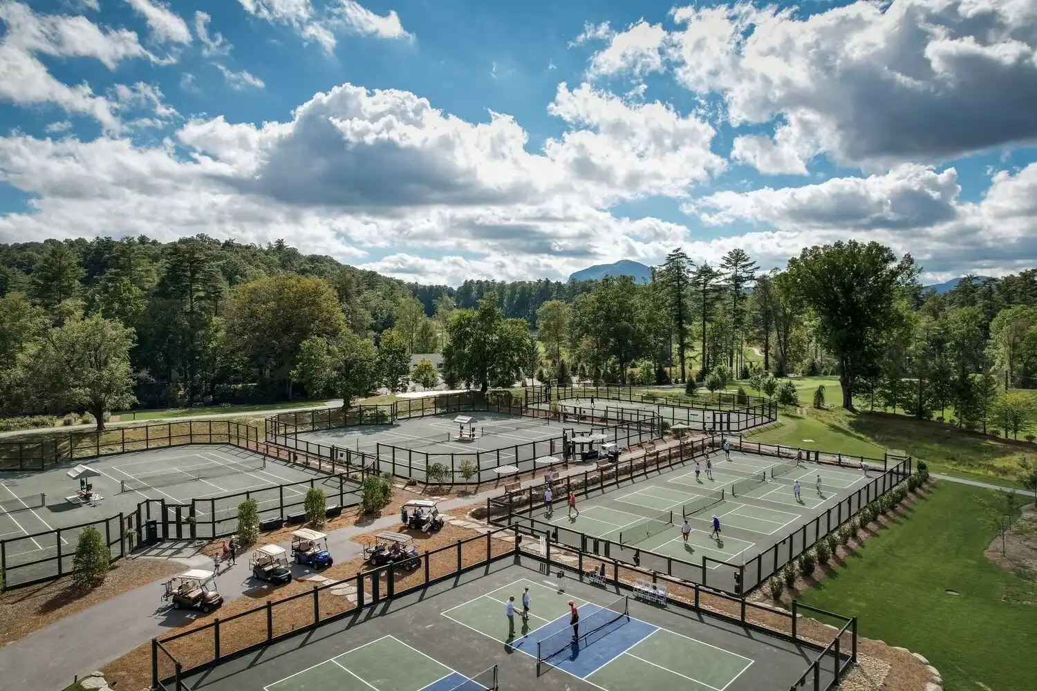 Overview shot of tennis and pickleball courts on a sunny day