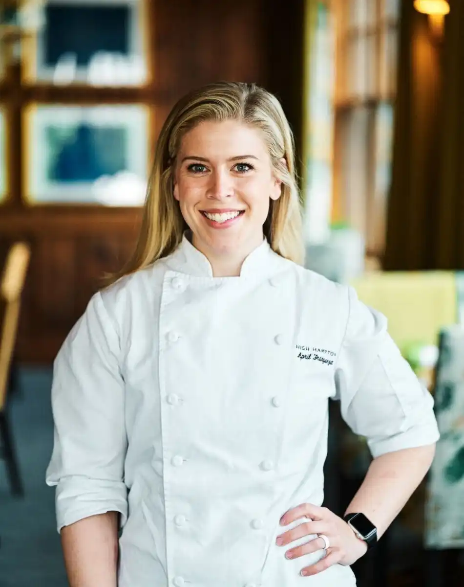 A headshot of Chef April Franqueza smiling