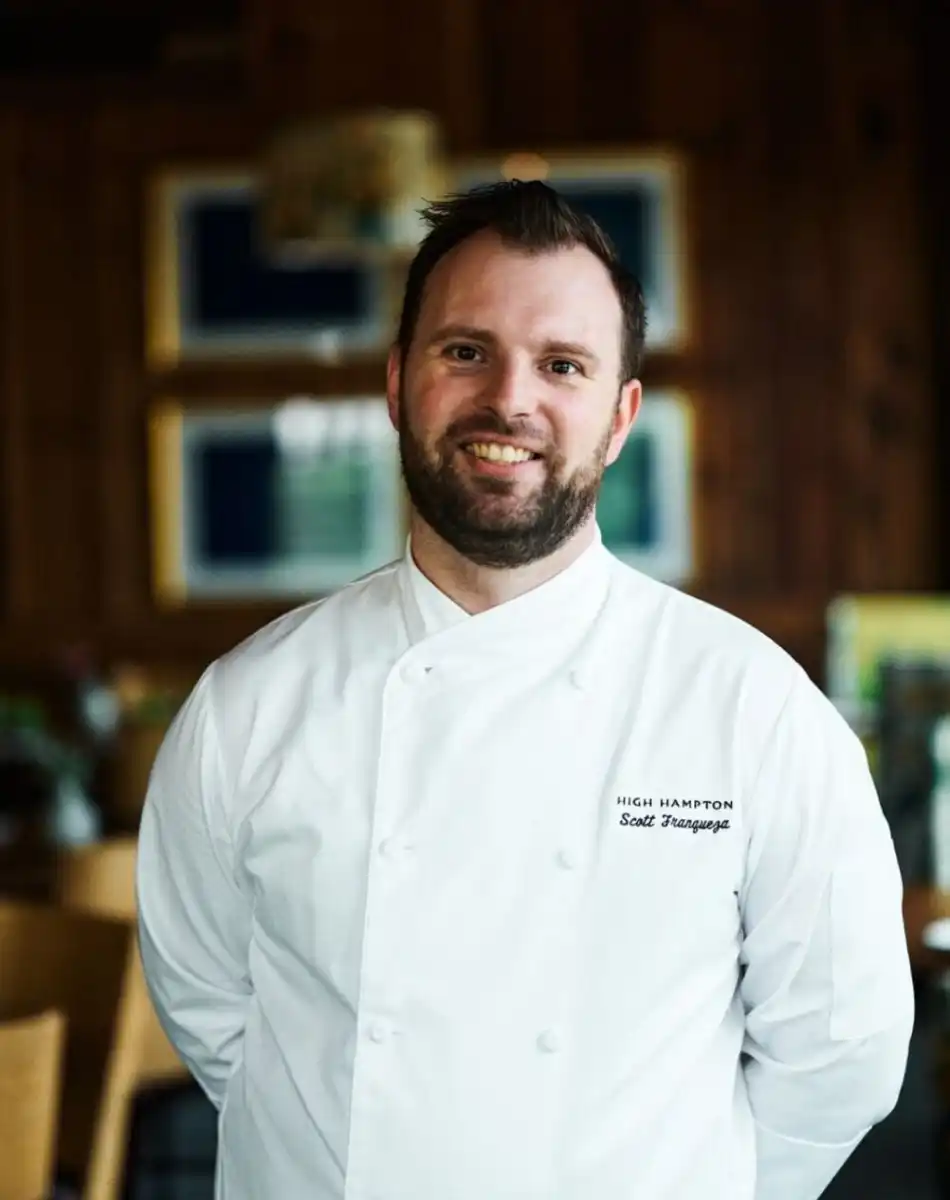 A headshot of Chef Scott Franqueza smiling
