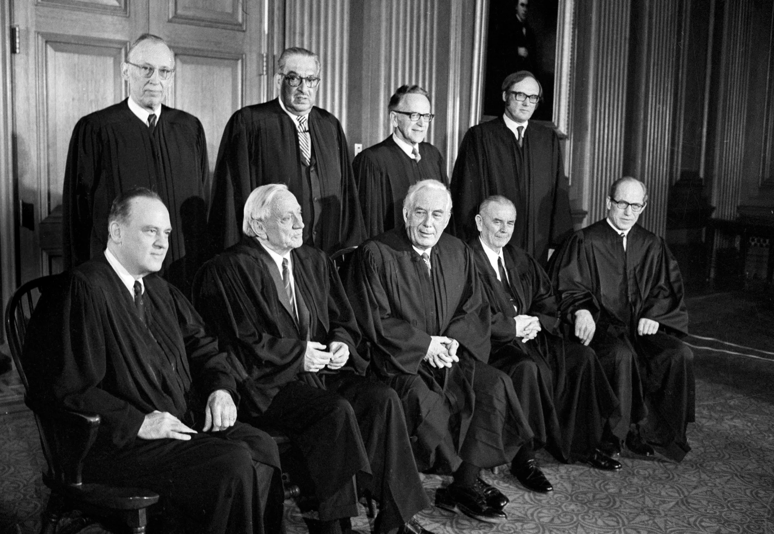 Protesters holding signs opposing the death penalty outside the U.S. Supreme Court.