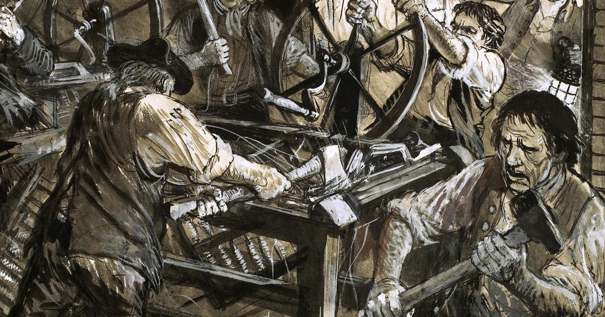 A historical depiction of Luddite textile workers breaking machines in an English factory.