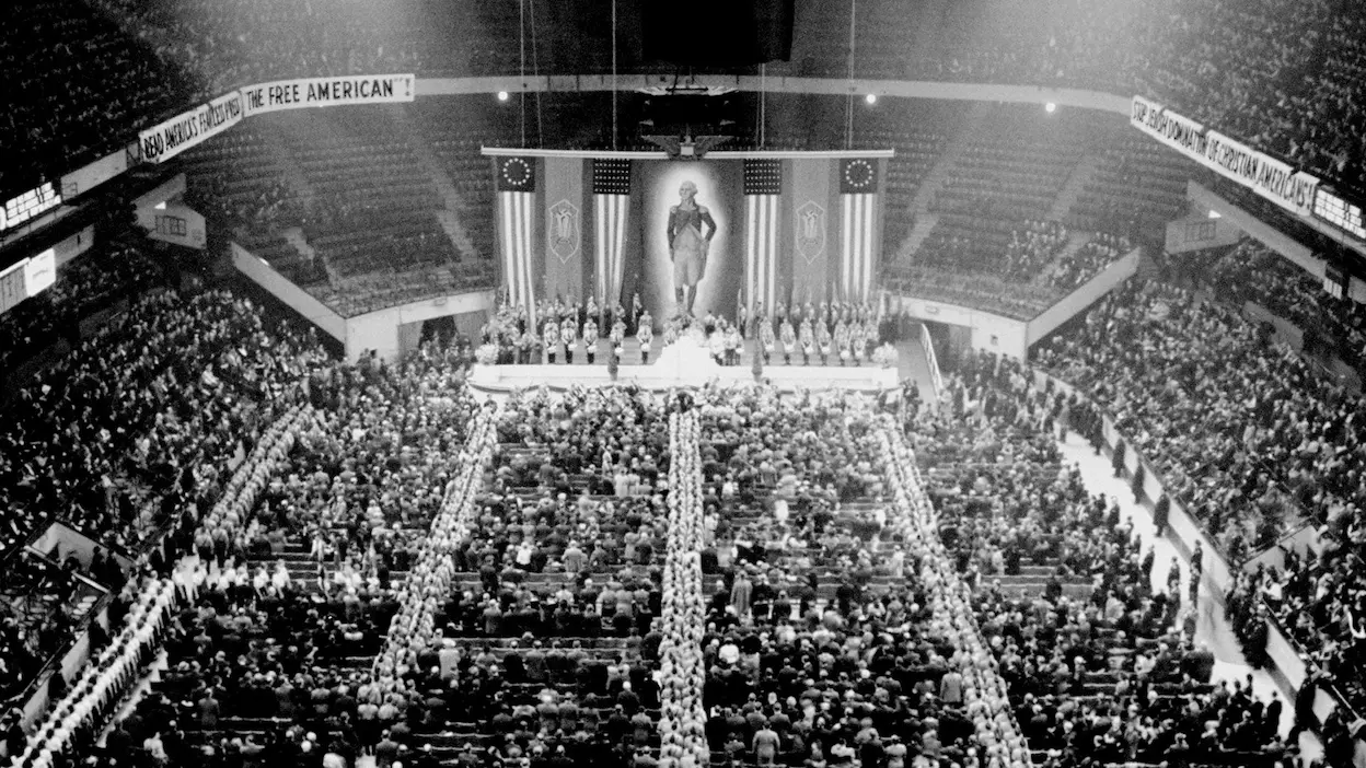 Inside Madison Square Garden, more than 20,000 Americans saluted a 30-foot portrait of George Washington flanked by swastikas. Outside, 100,000 protesters filled the streets, warning that fascism was not just a European problem.