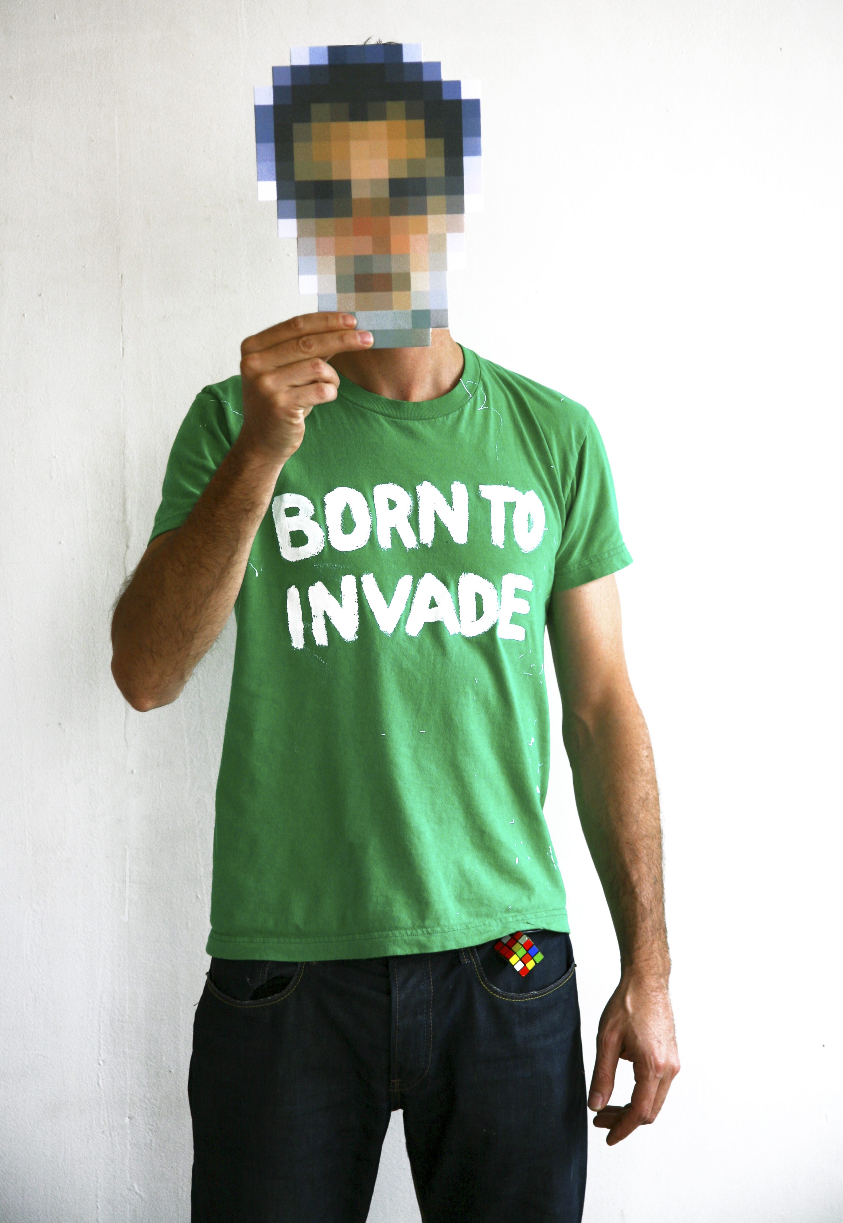 The anonymous street artist Invader wears a pixelated mask, protecting his identity while 'invading' cities worldwide.