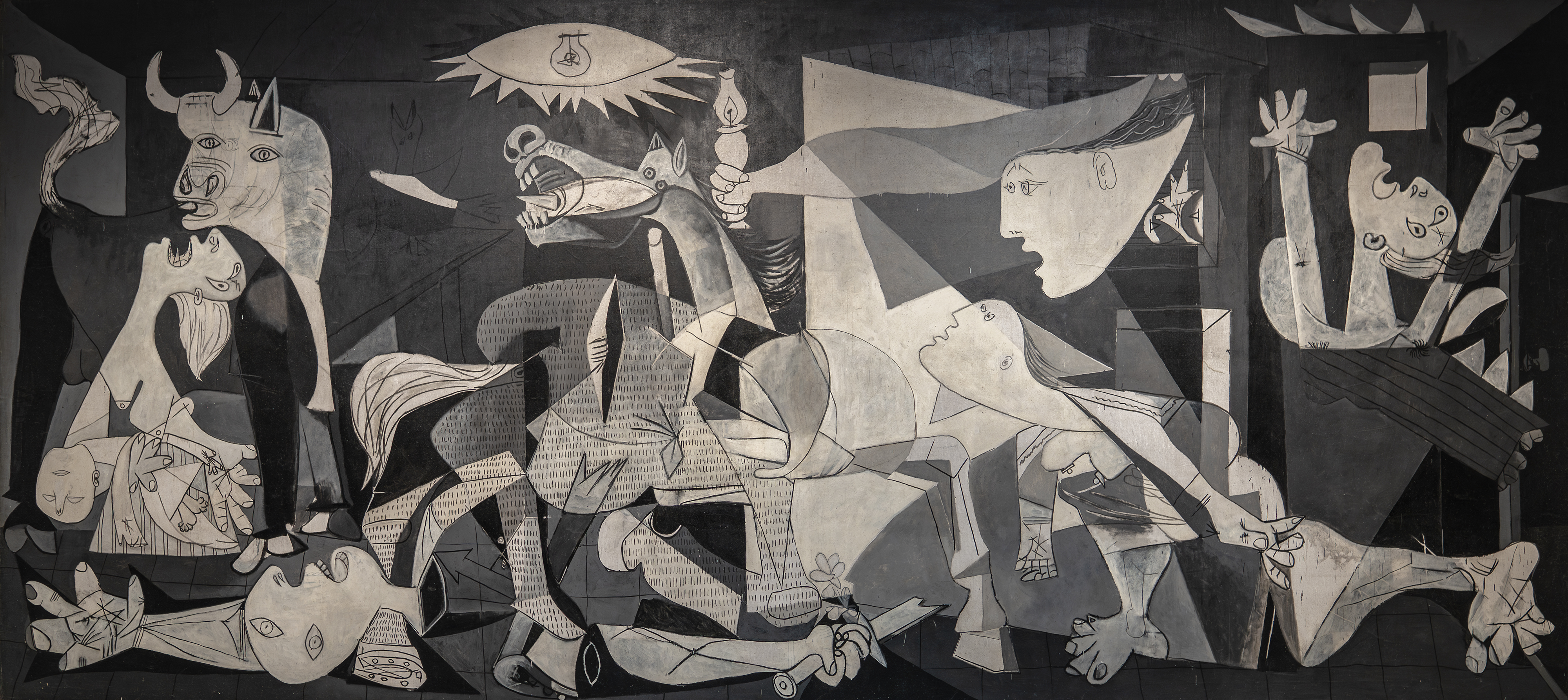 Picasso’s Guernica, in black and white, captures the horror of war with jagged figures, shattered forms, and emotional chaos.
