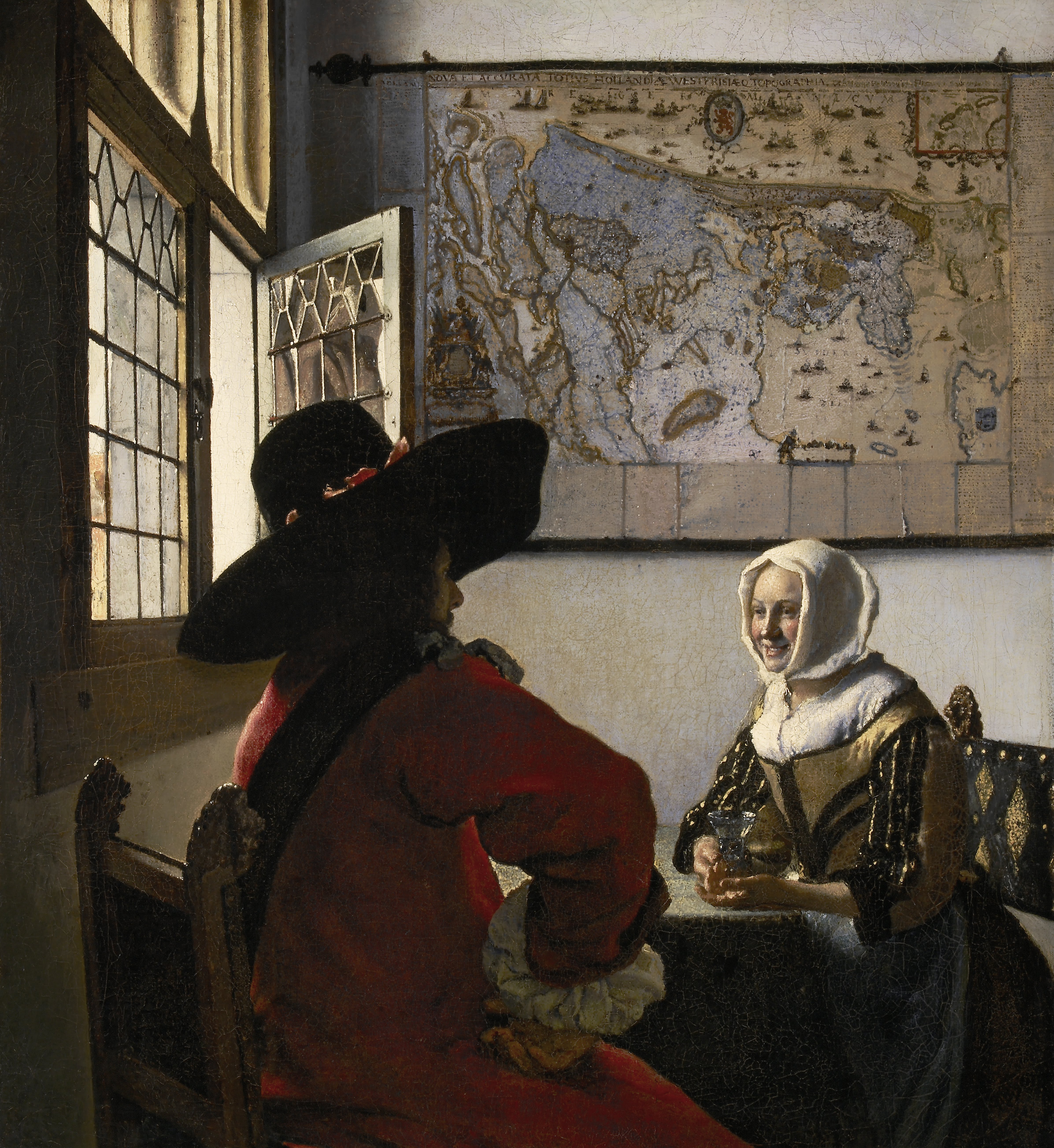 The Officer and the Laughing Girl, a Vermeer painting showing a soldier speaking to a smiling woman in a sunlit room.