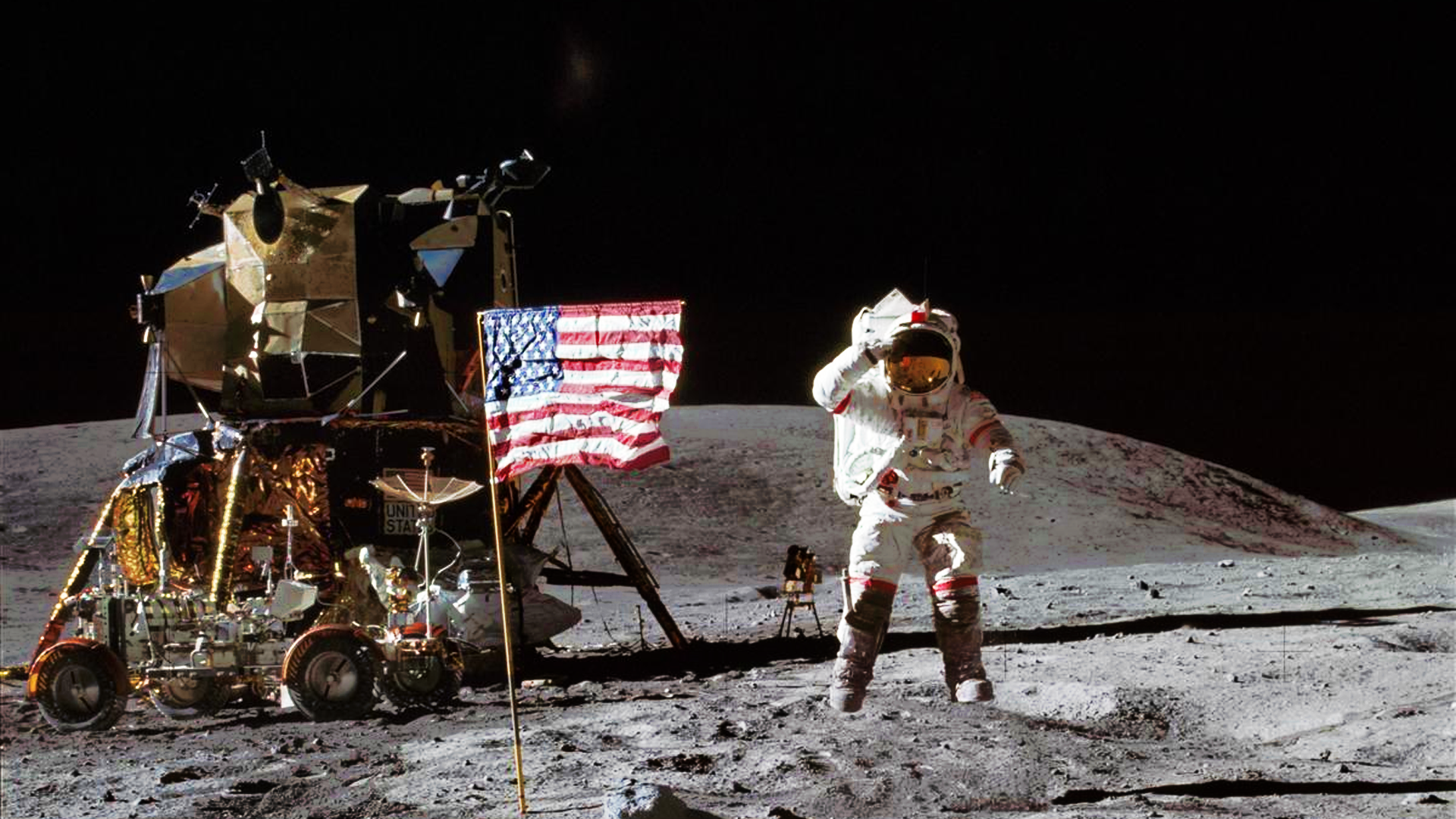 Neil Armstrong taking the first step on the moon.