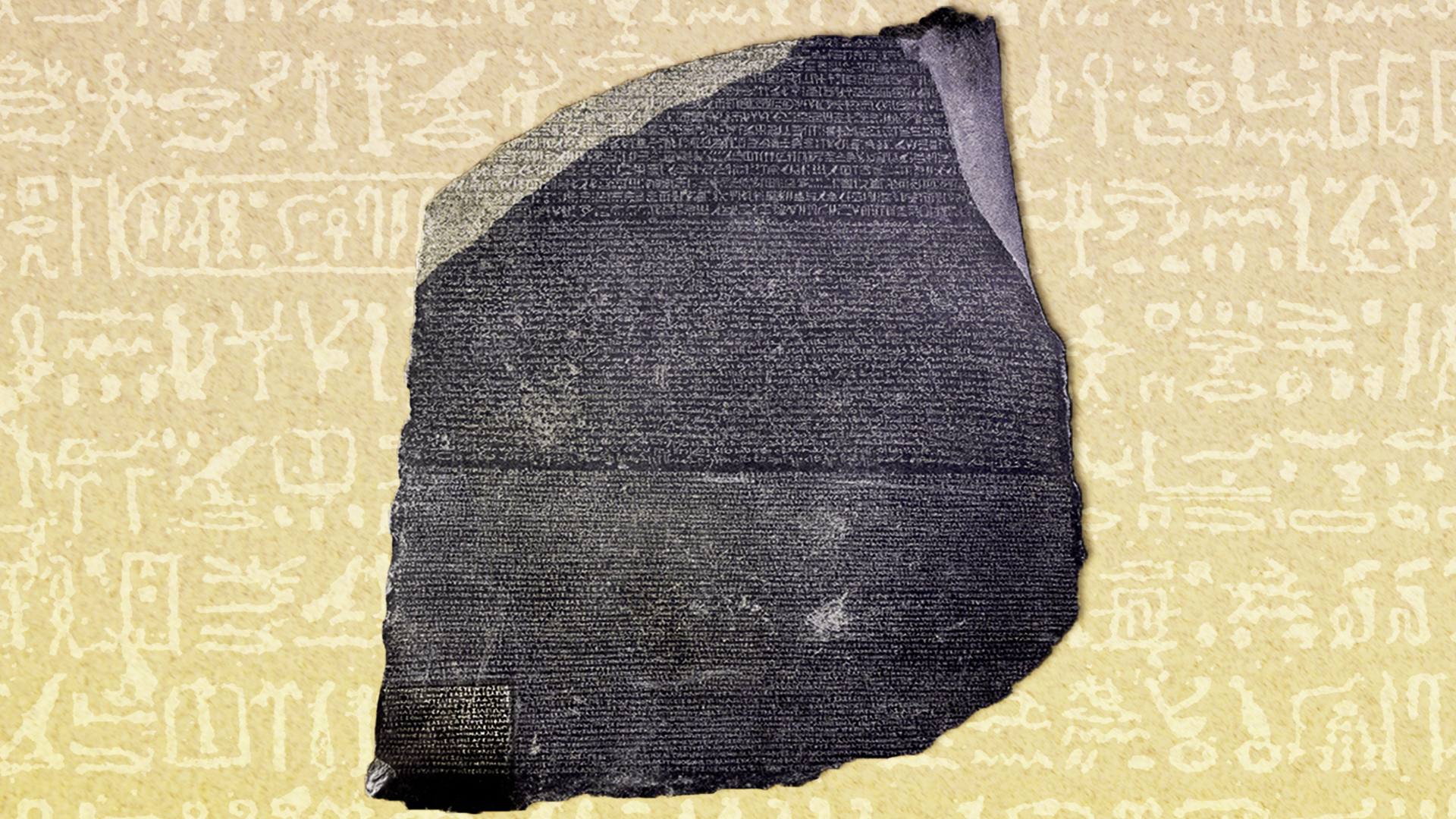 An image of the Rosetta Stone, featuring three distinct scripts carved into dark basalt: Greek, Demotic, and Egyptian hieroglyphics.
