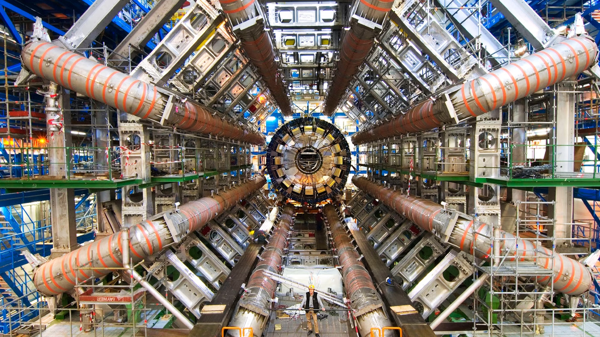 The 17-mile underground Large Hadron Collider tunnel at CERN lit with superconducting magnets.