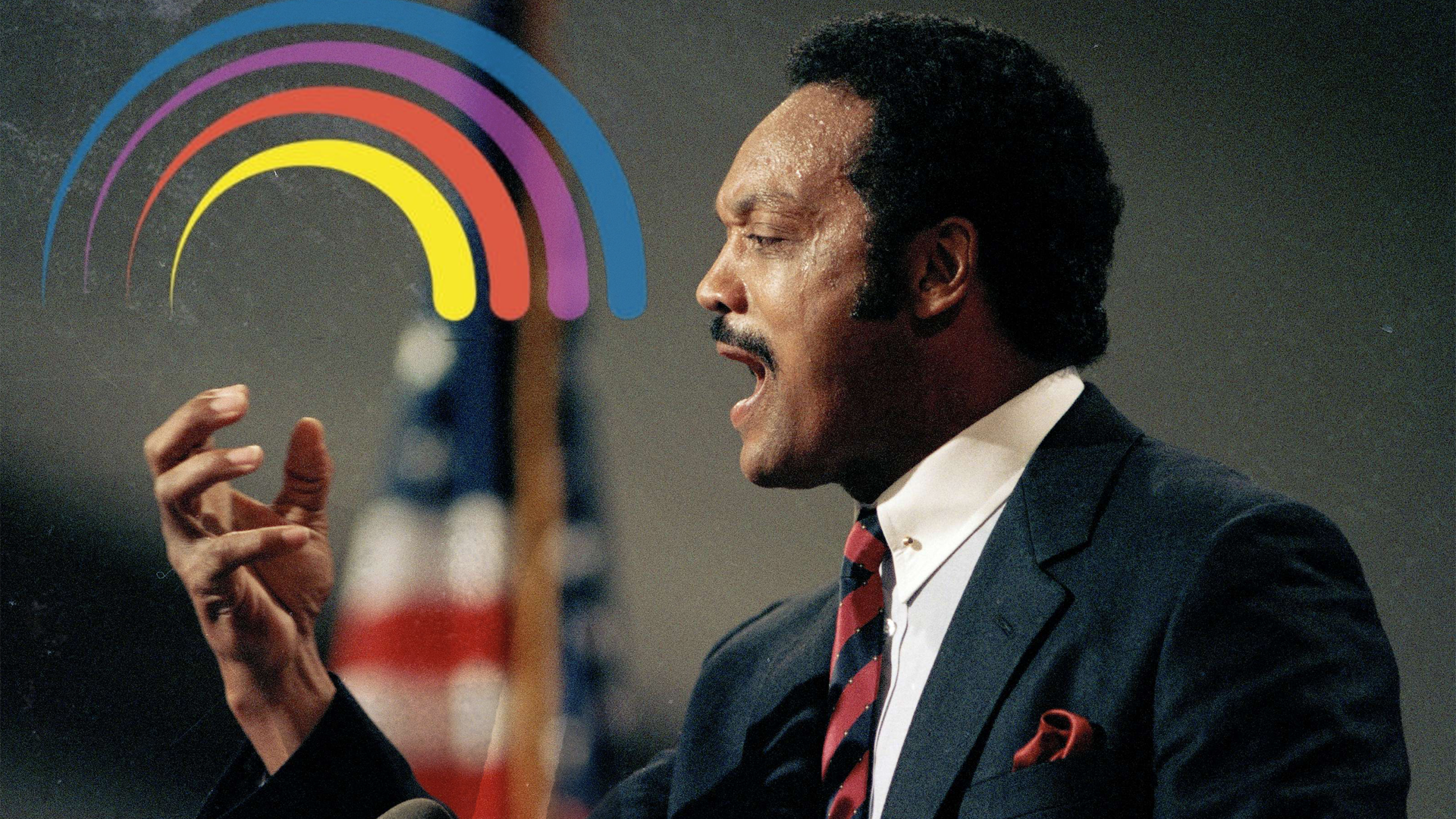 Rev. Jesse Jackson at the podium during the 1984 Democratic National Convention, gesturing with passion before a cheering crowd.