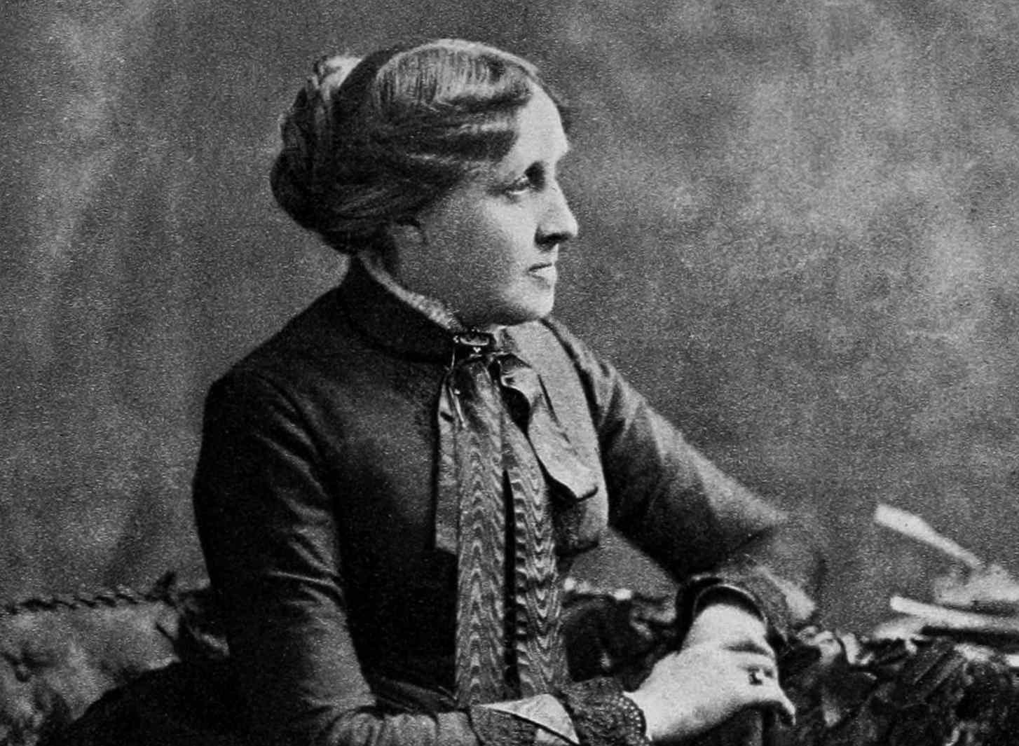 An early 19th-century portrait of a young Louisa May Alcott, with determined eyes and a poised expression.