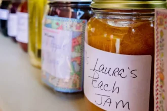 Fruit preserves are lined up at a vendor’s booth at the Clarksdale Farmers Market in Clarksdale, Mississippi