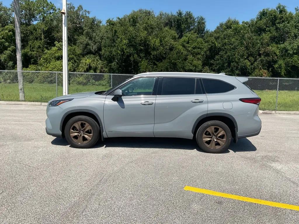 Florida Fine Cars - Used TOYOTA HIGHLANDER 2022 ORLANDO HYBRID BRONZE EDITION