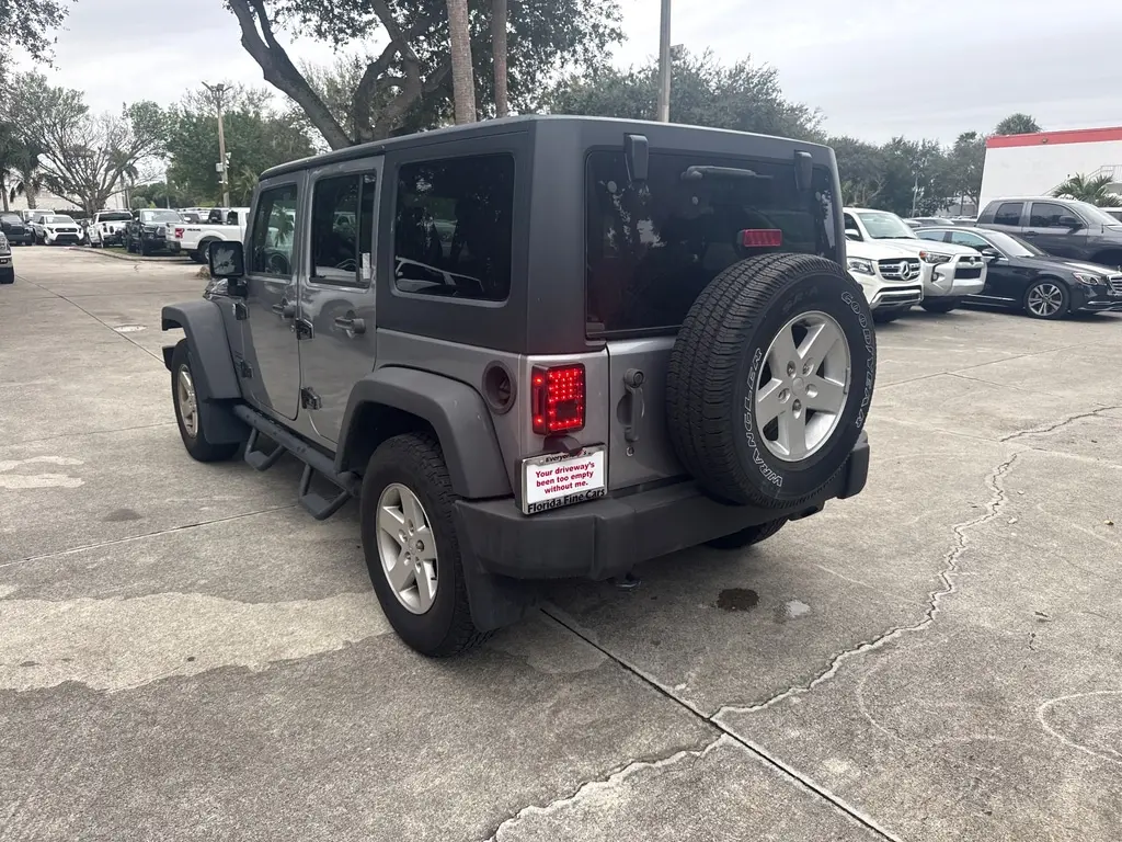 Florida Fine Cars - Used JEEP WRANGLER UNLIMITED 2015 WEST PALM SPORT